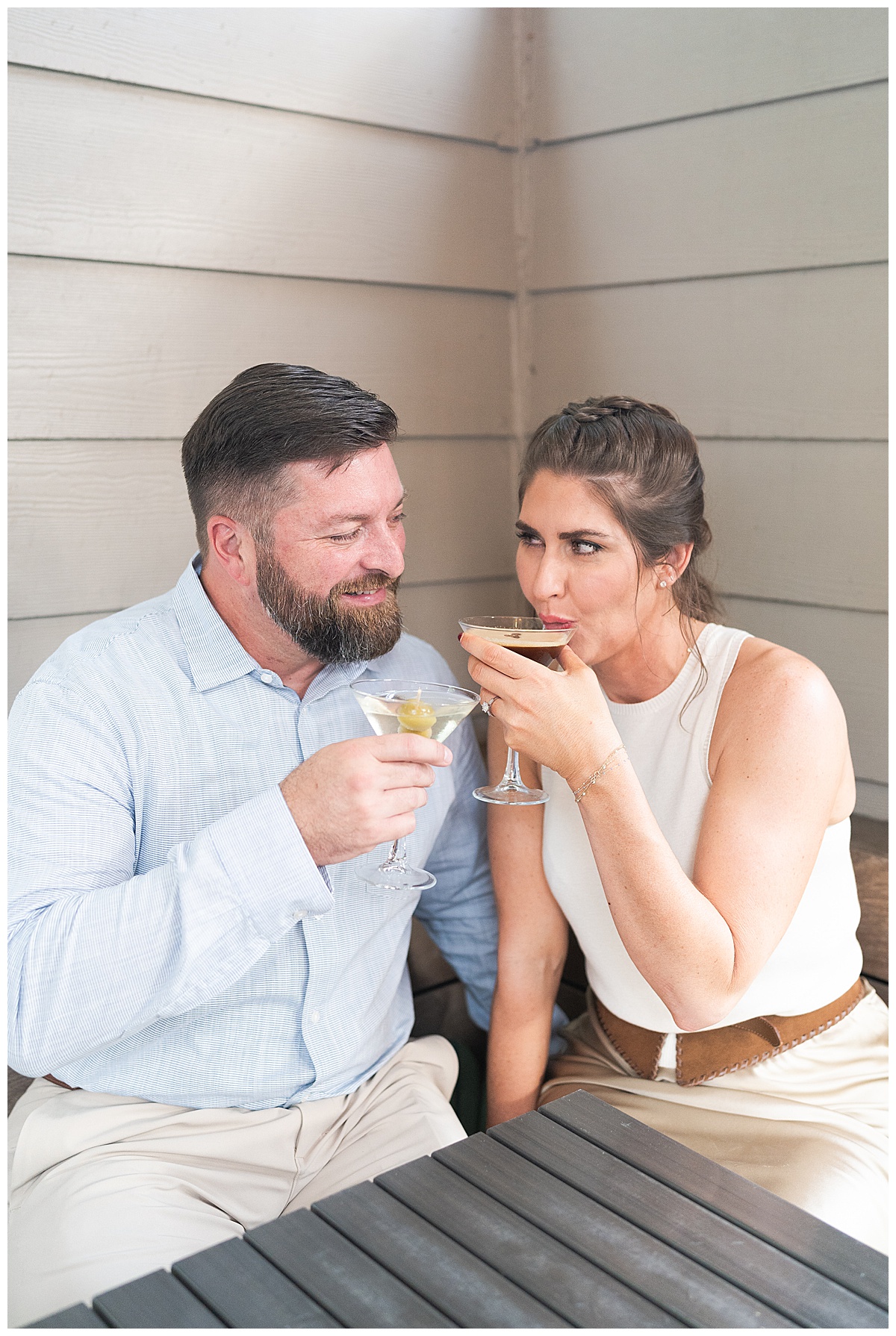 Man and woman share a drink for Houston’s Best Wedding Photographers