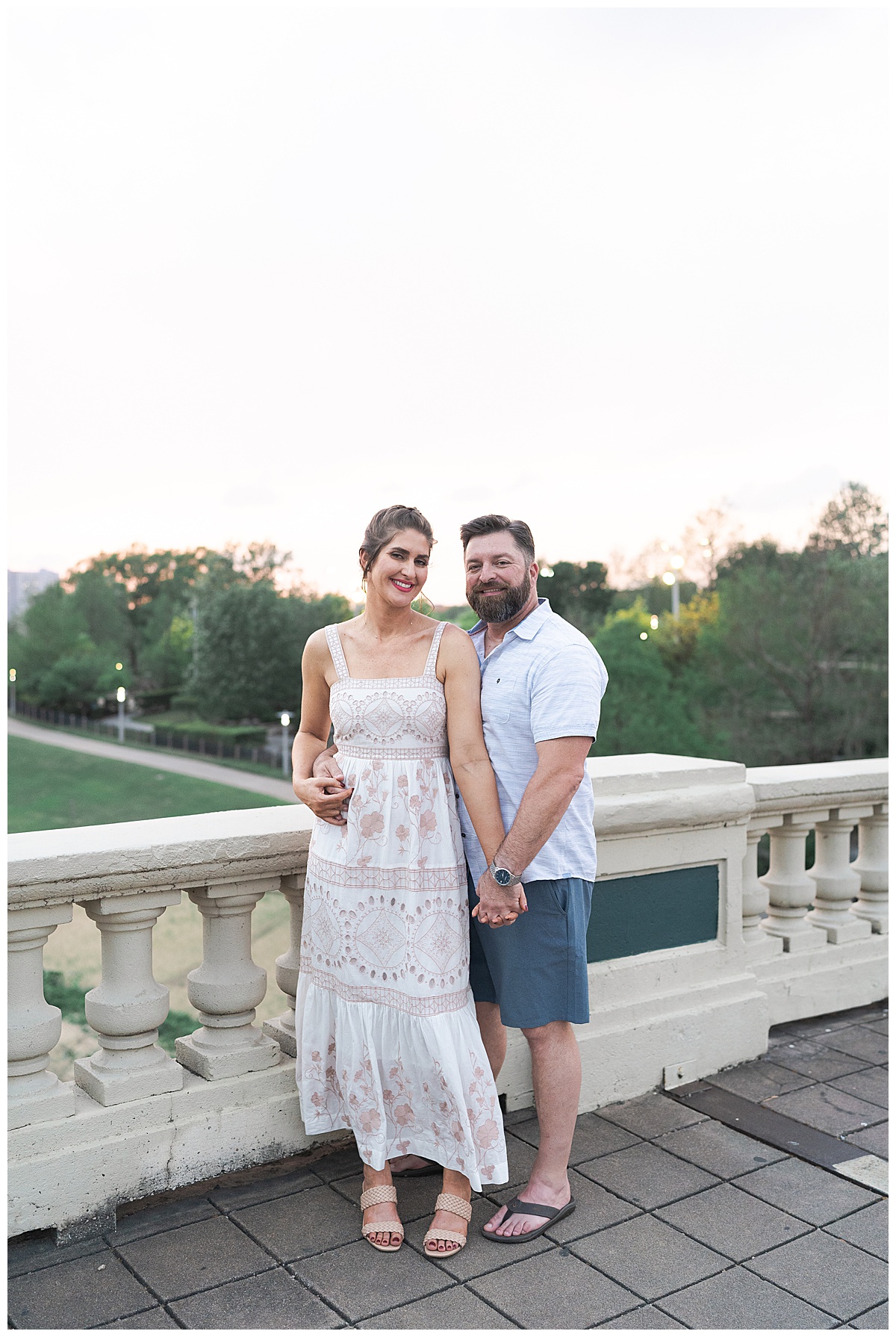 Bride and groom smile together during Downtown Houston Engagement Session
