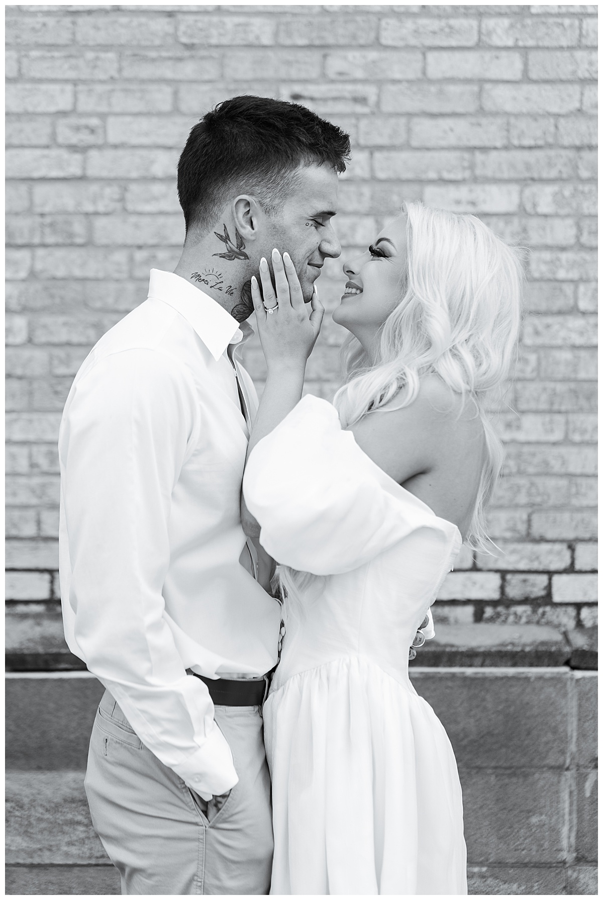 Couple hold one another close for Swish & Click Photography
