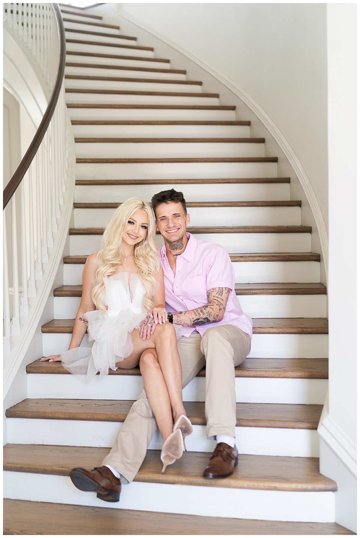 Couple sit on stairs together for Houston’s Best Wedding Photographers
