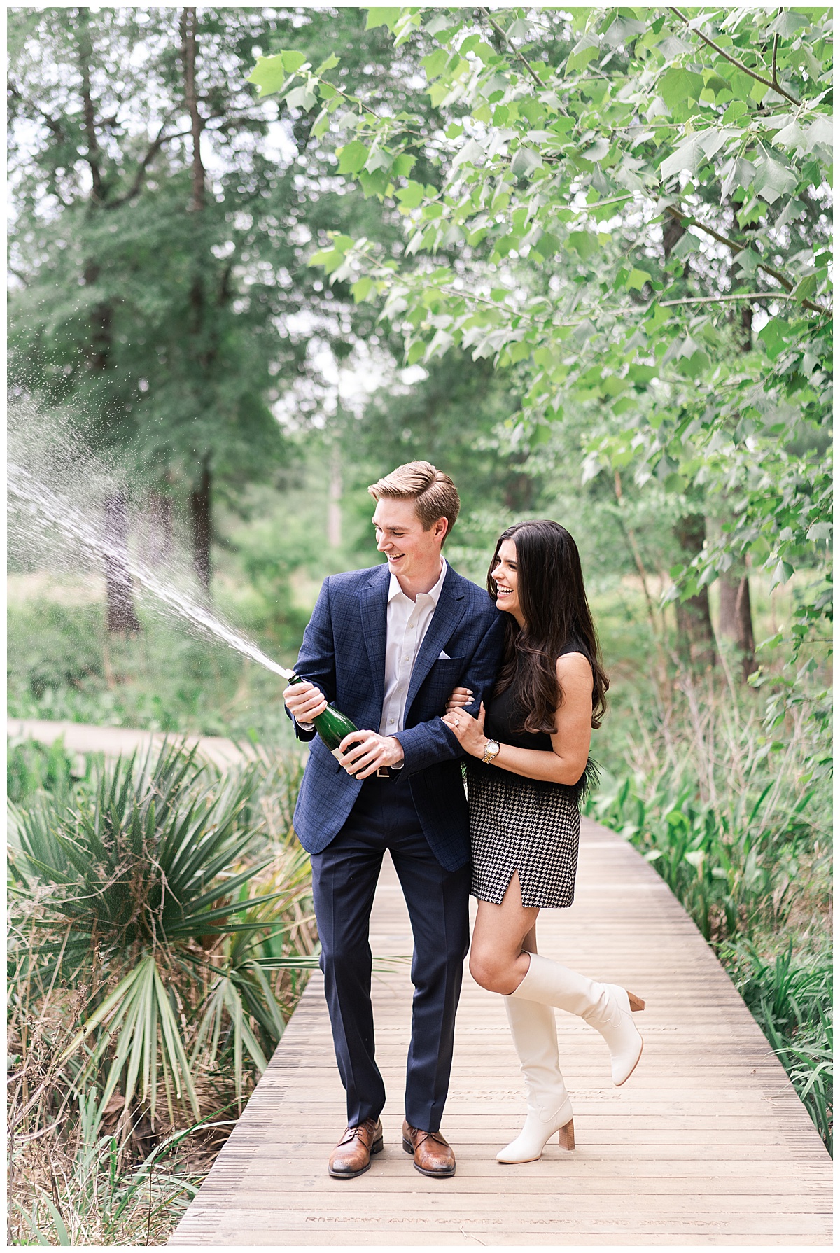Couple pops champagne for Houston’s Best Wedding Photographers