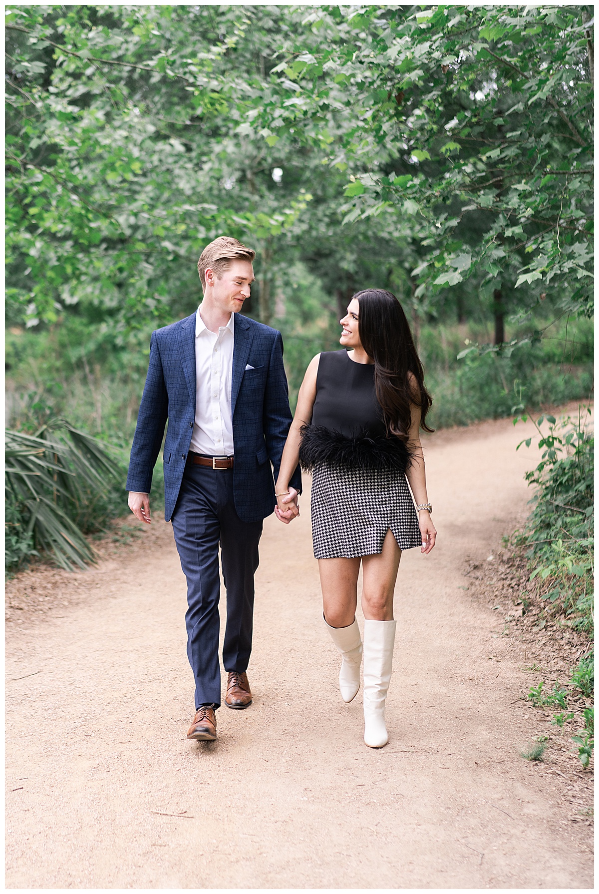 Future husband and wife walk hand in hand for Houston’s Best Wedding Photographers