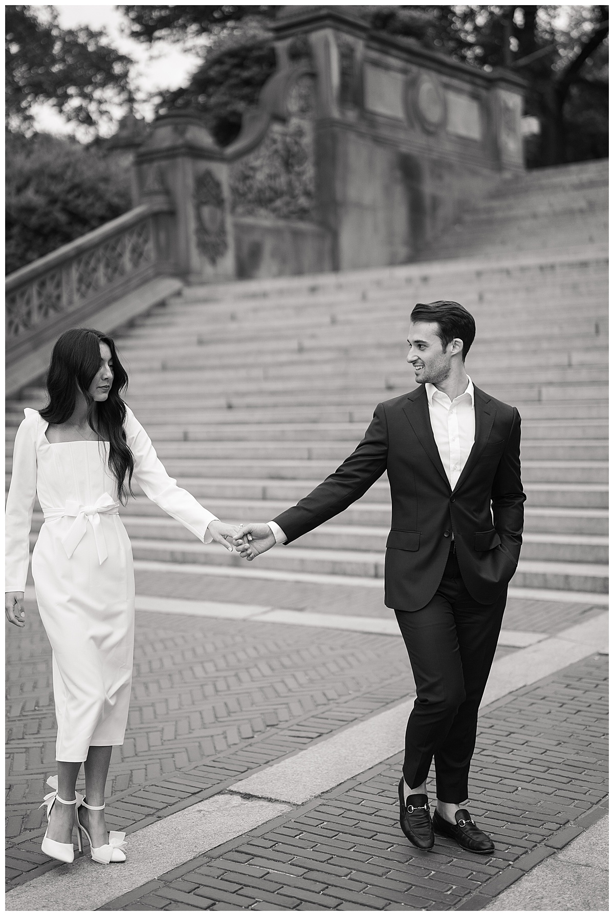 Couple walks through Central Park for Swish & Click Photography
