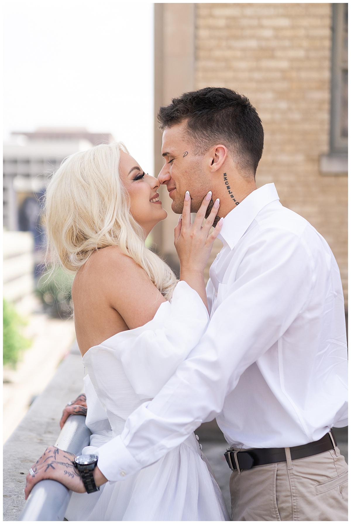 couple almost kiss and smile at one another for Swish & Click Photography
