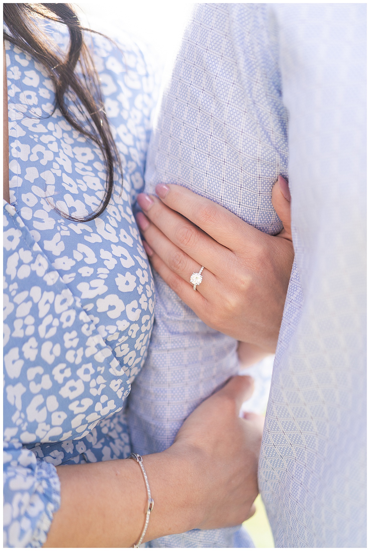 Stunning engagement ring is shining bright in one of my Favorite Engagement Photo Poses 