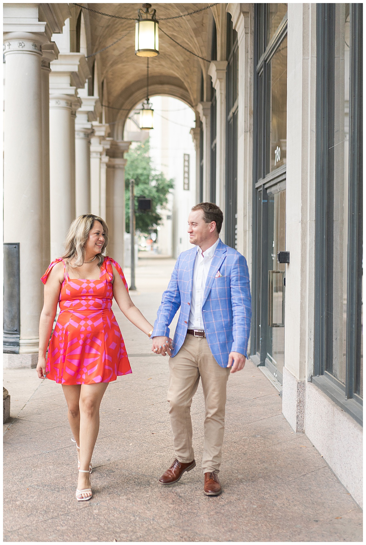 Two people walk hand in hand together for Houston’s Best Wedding Photographers