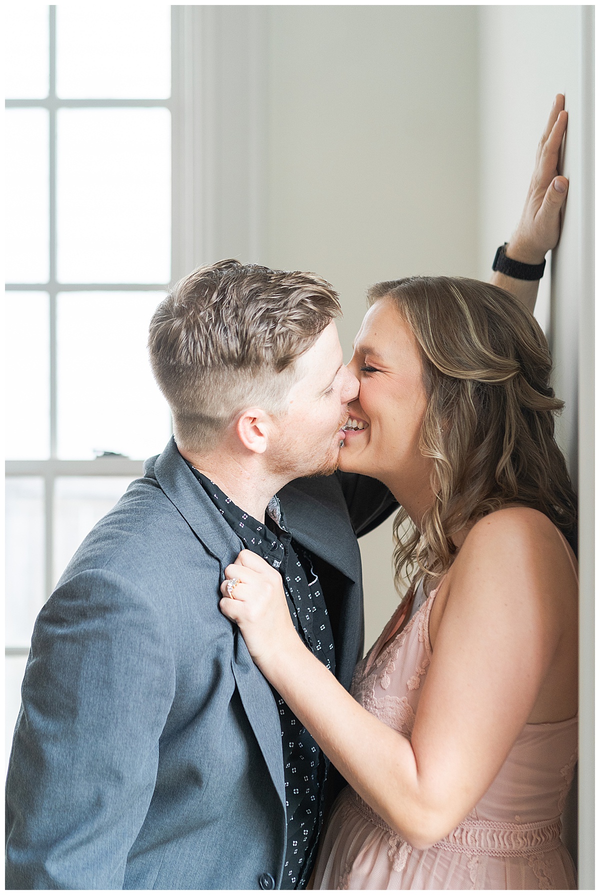 Couple share a kiss during Houston Engagement session