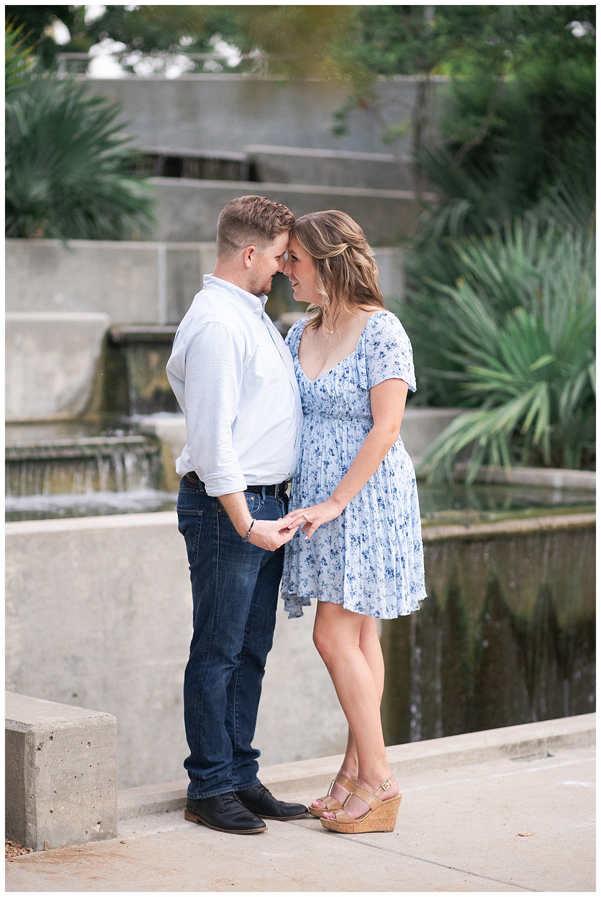Couple hold each other close for Houston's best engagement photographers