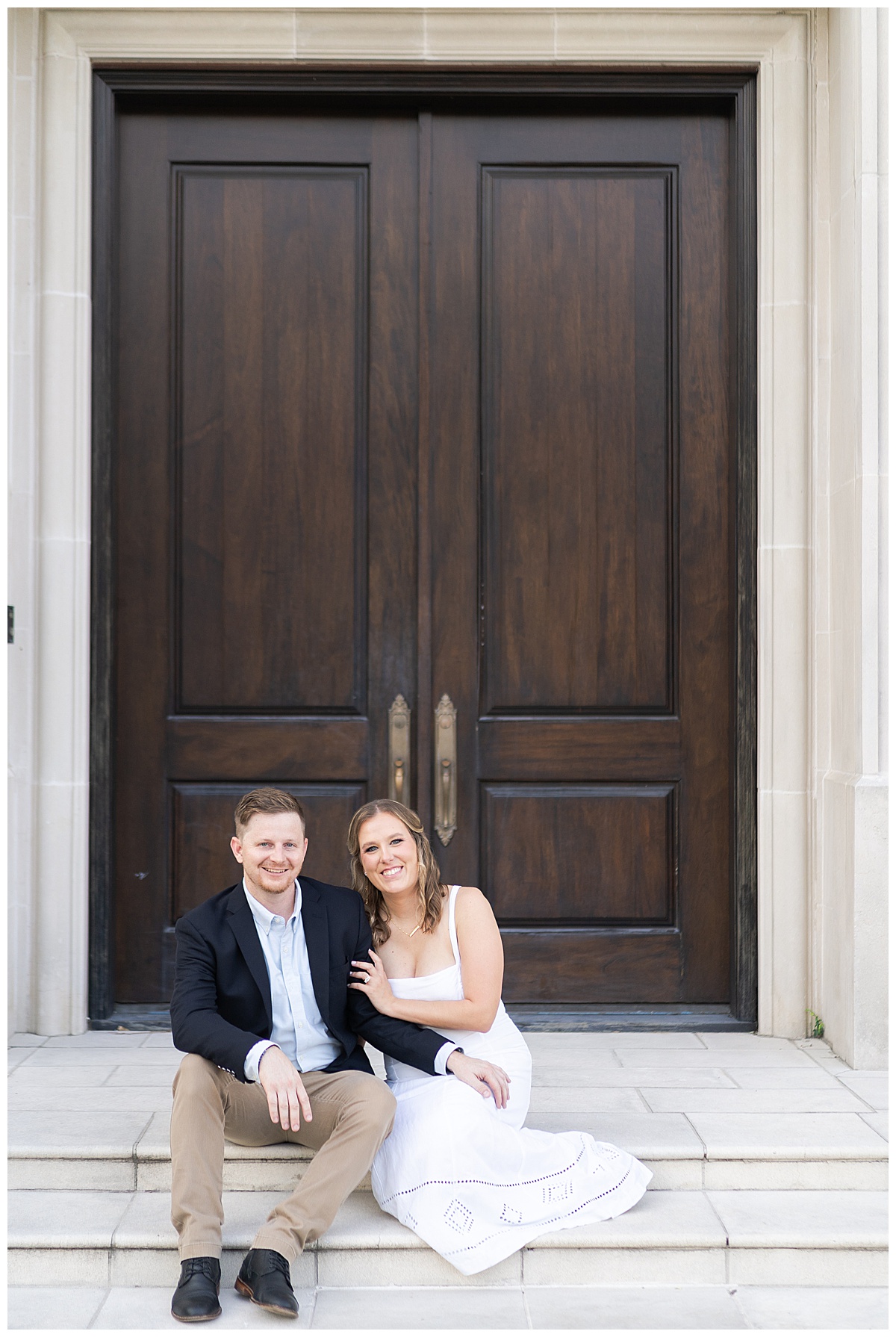 Couple sit together on some steps demonstrating the Best Engagement Session Poses 