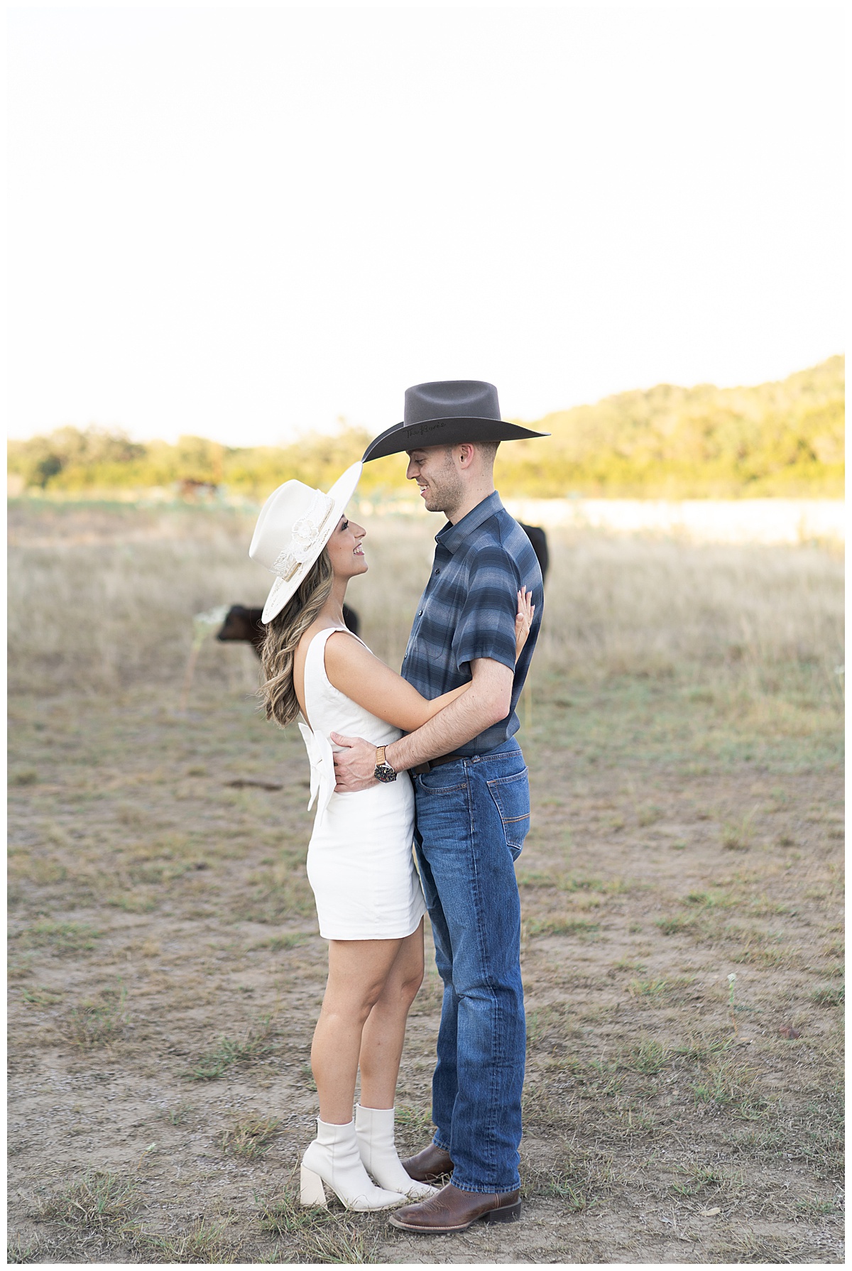 Man and woman smile at one another during their Austin Engagement Session