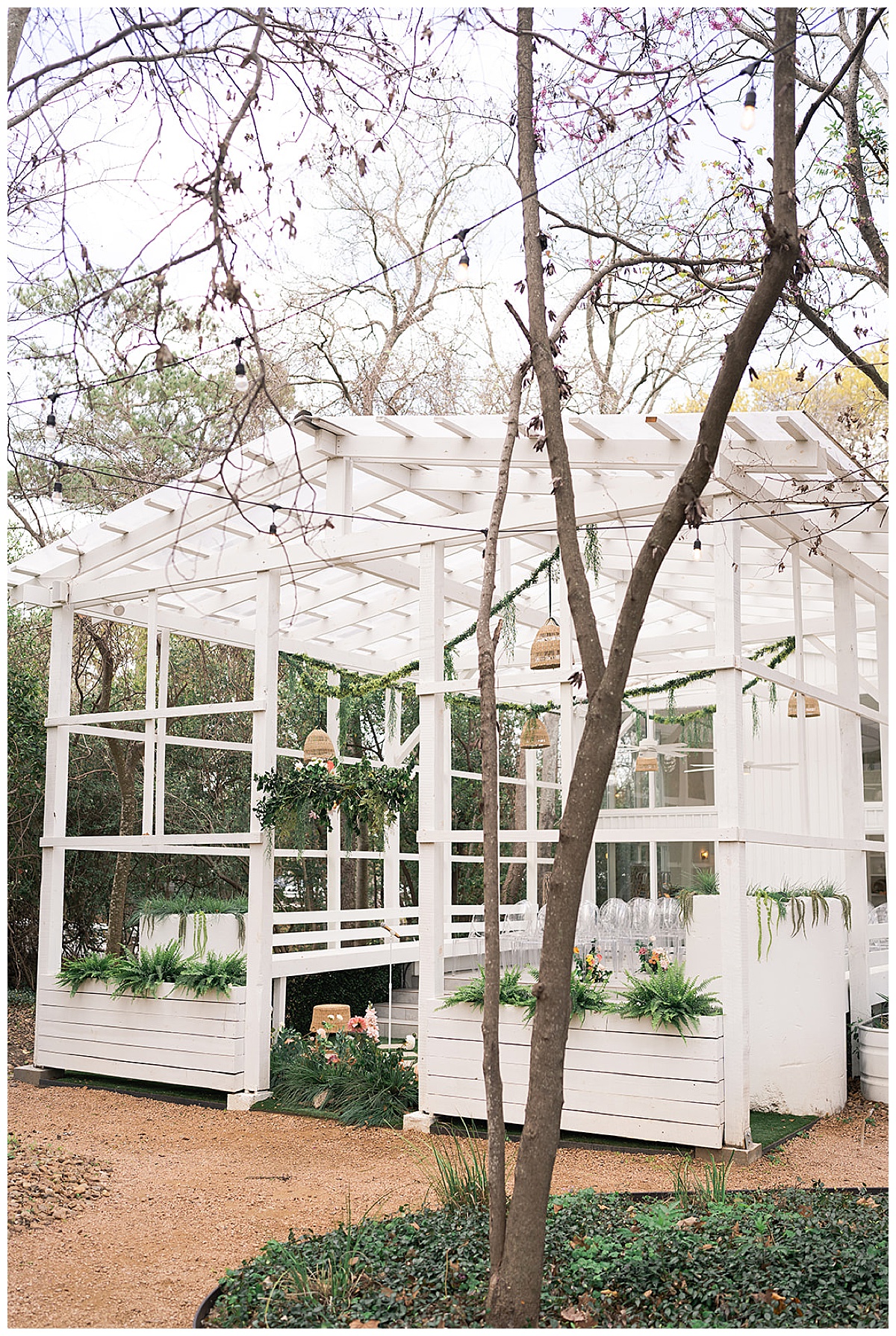 Gorgeous white greenhouse at a Houston wedding venue
