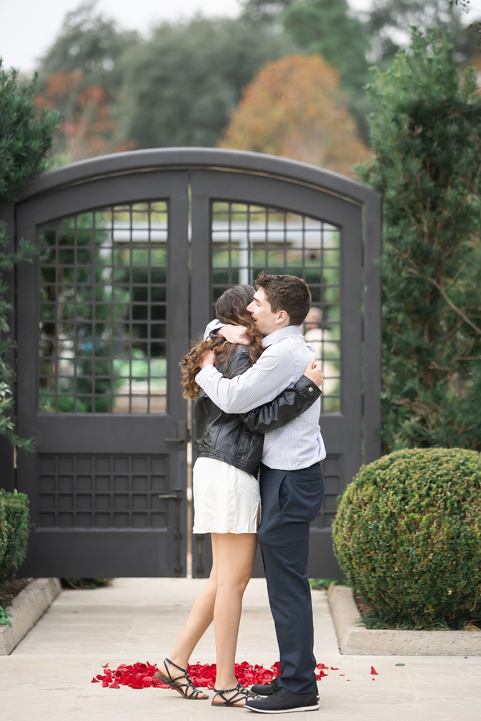 Couple share a big hug by Houston Marriage Proposal Photographer