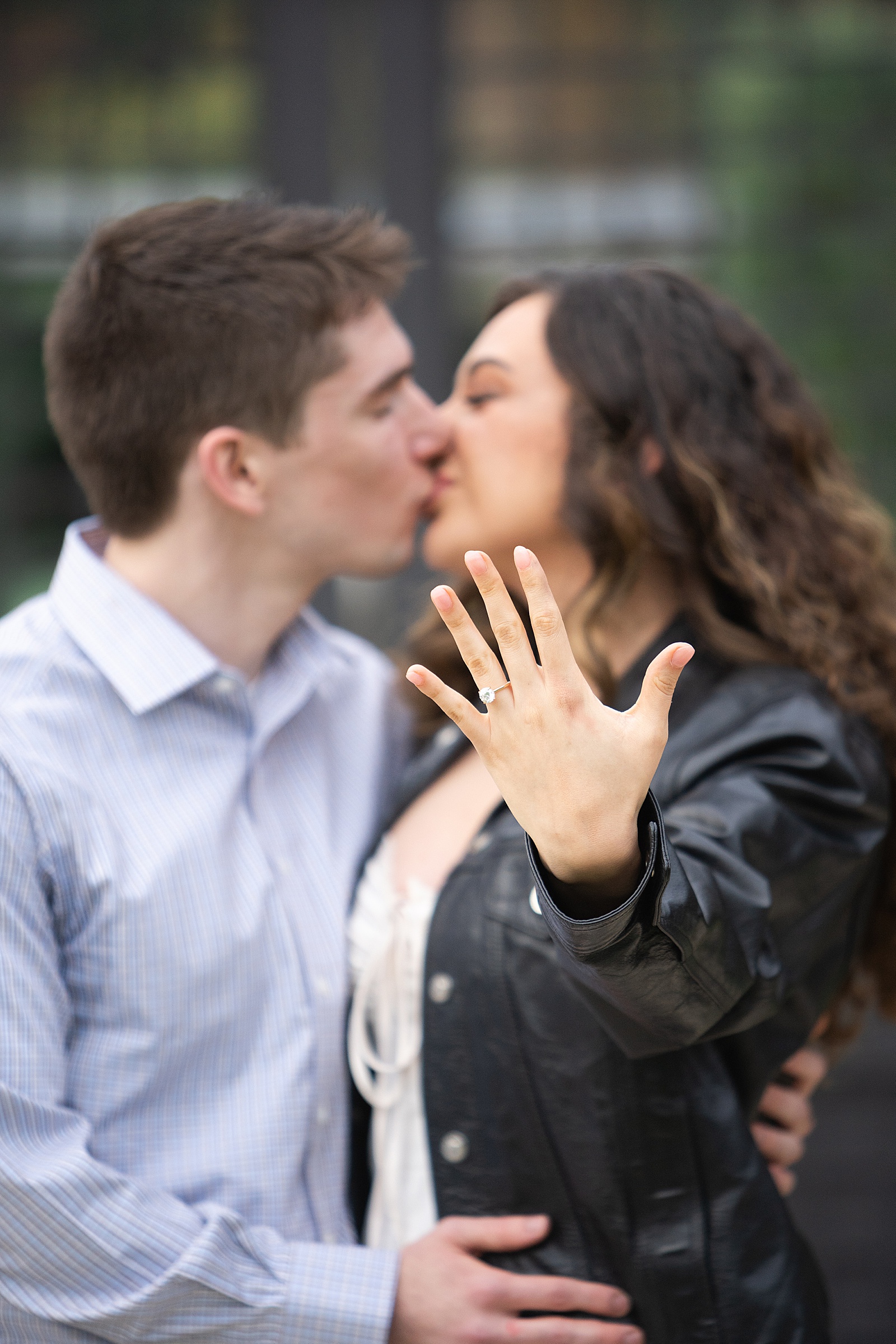 Woman shows off ring by Houston Marriage Proposal Photographer