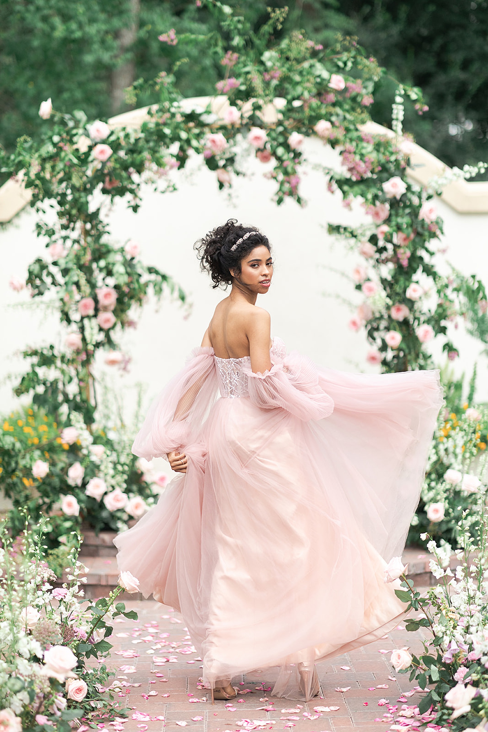 Woman wears pink gown by Swish & Click Photography