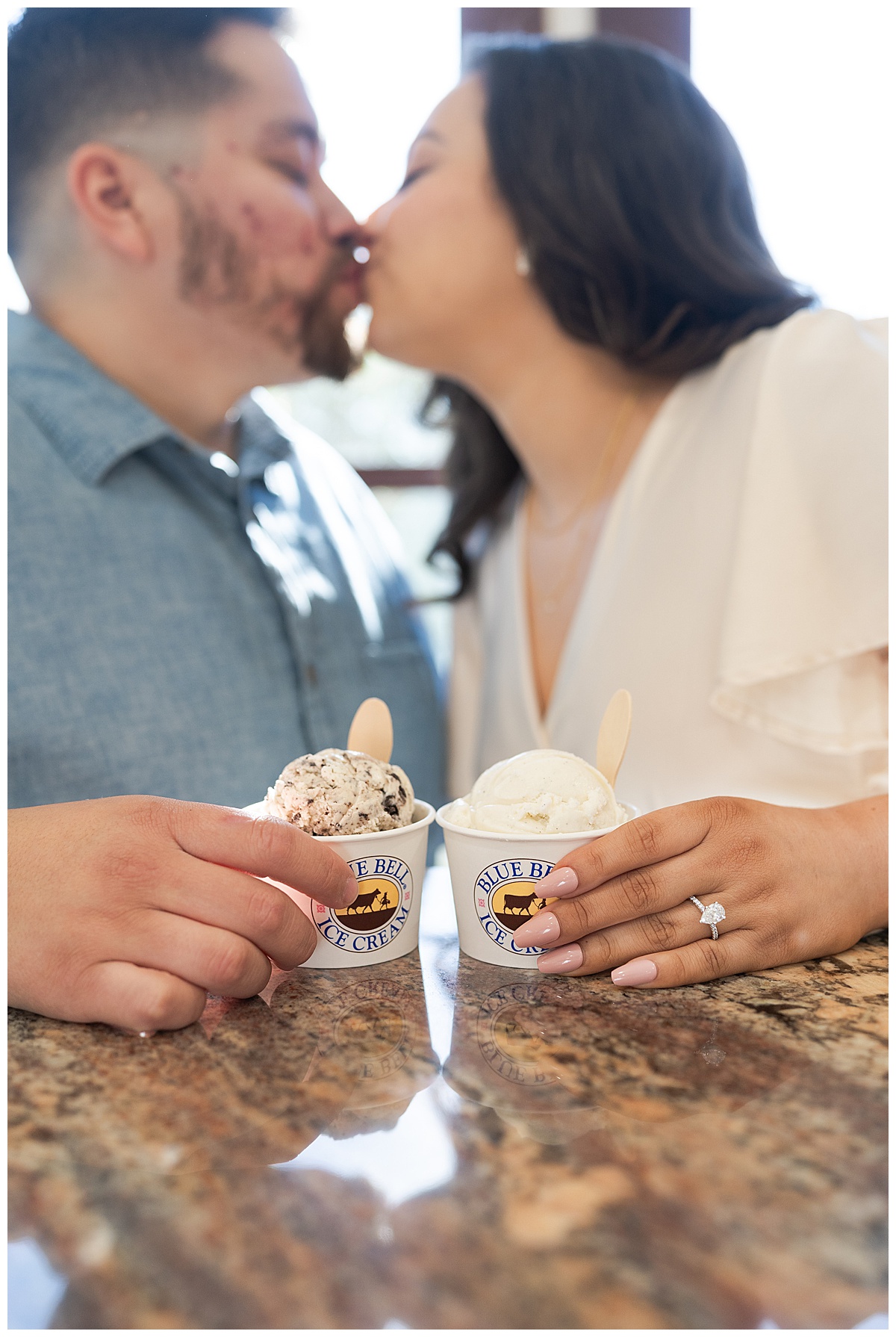Couple share a kiss with ice cream for Swish & Click Photography