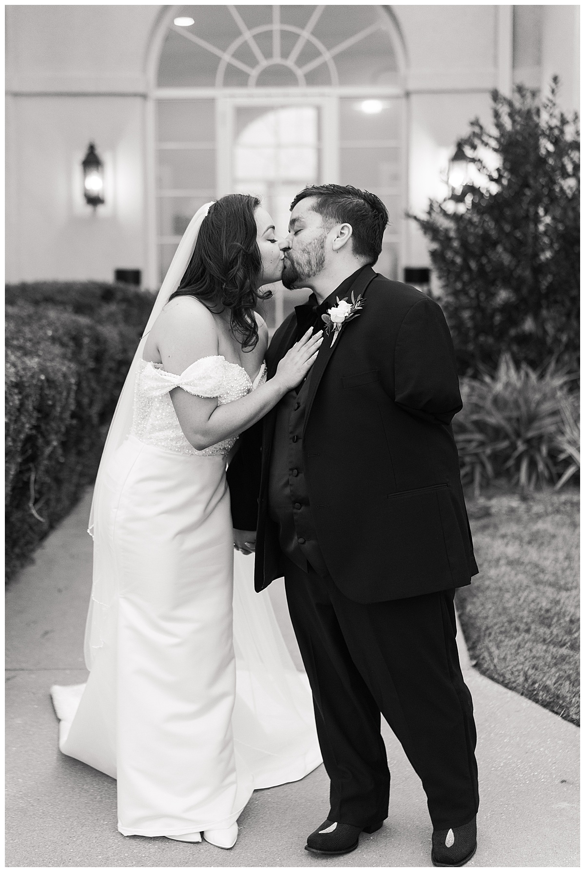 Bride and groom share a kiss for Houston’s Best Wedding Photographers
