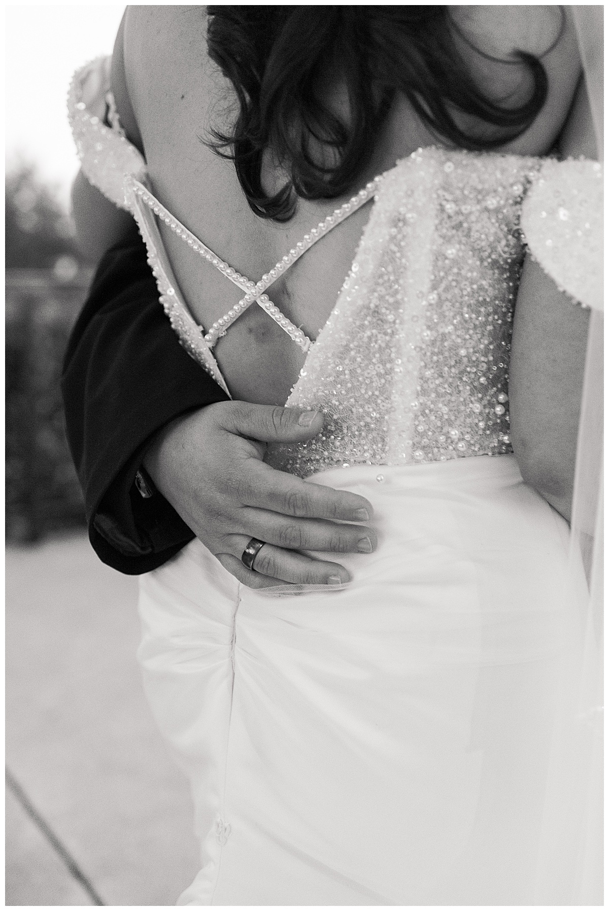 Groom holds bride close for Houston’s Best Wedding Photographers