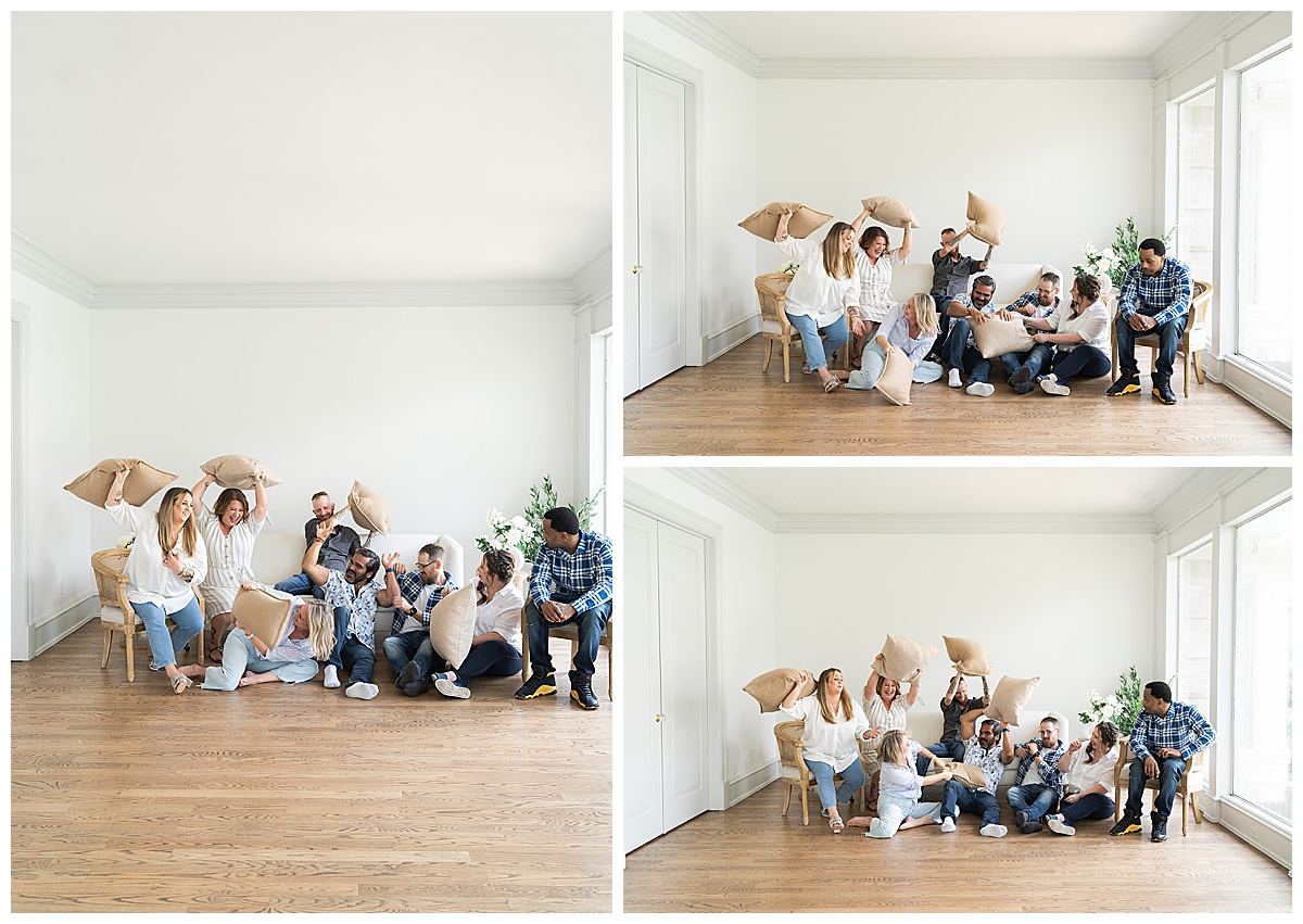 Company has playful pillow fight together during a Branding Session for College Park Flowers