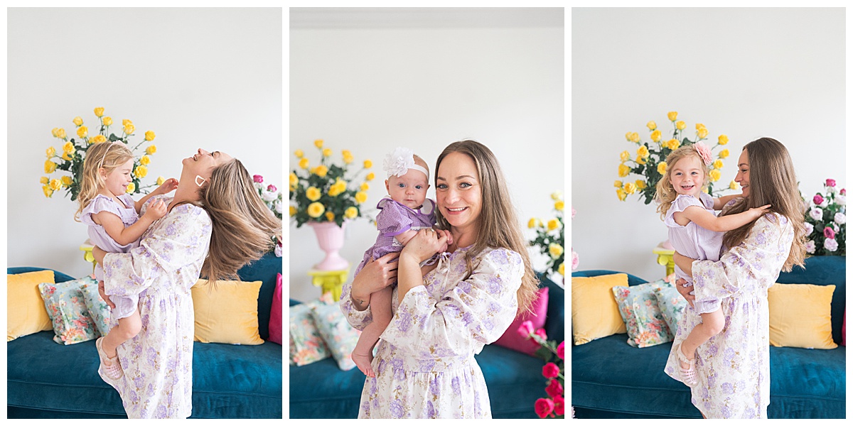 Mom holds young daughter for Swish & Click Photography