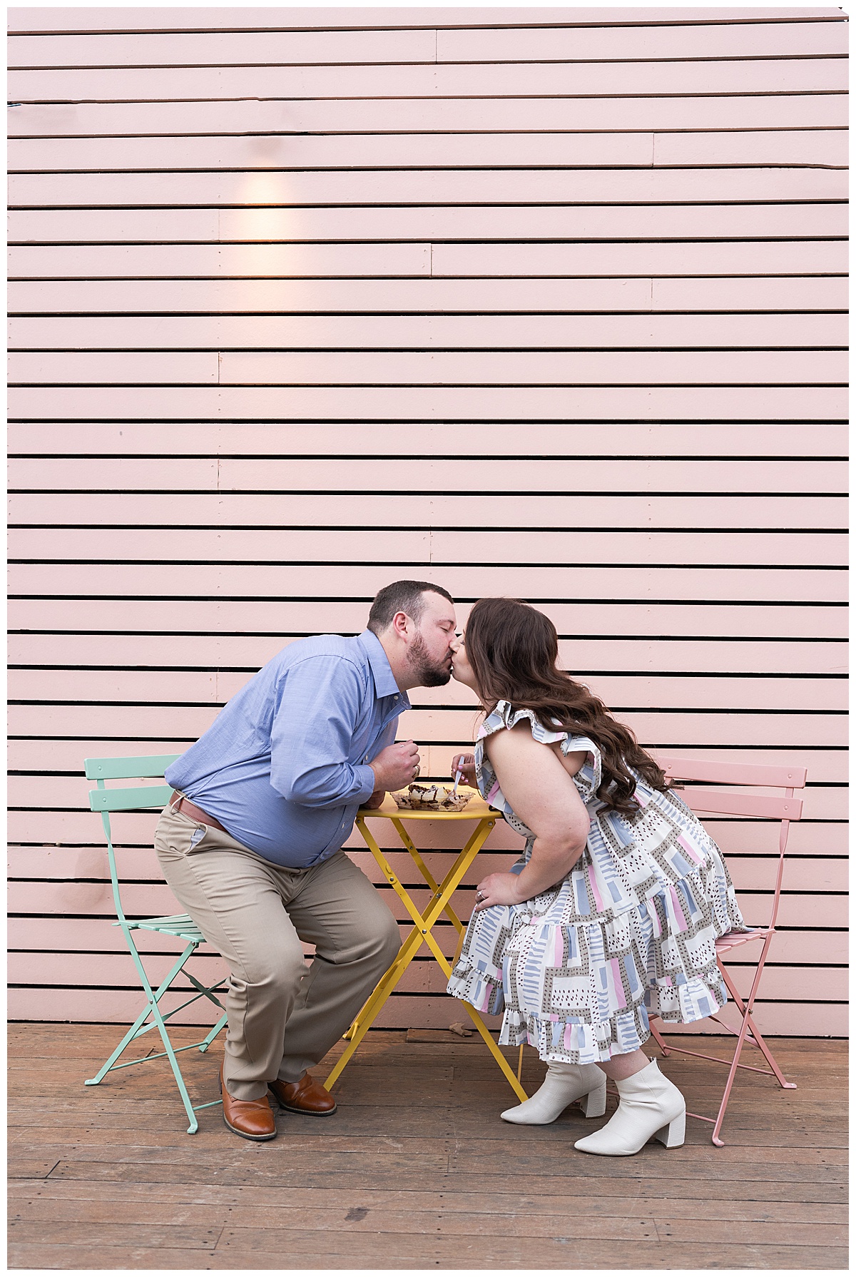 Man and woman share a kiss during their Boulevard Oaks Engagement Session
