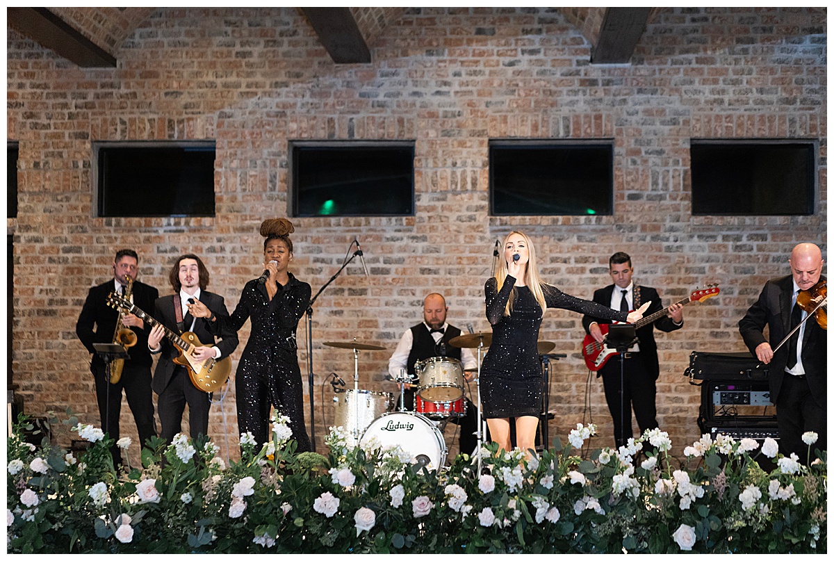 Couple had a live band perform To Create A Wedding Guest Experience They’ll Remember