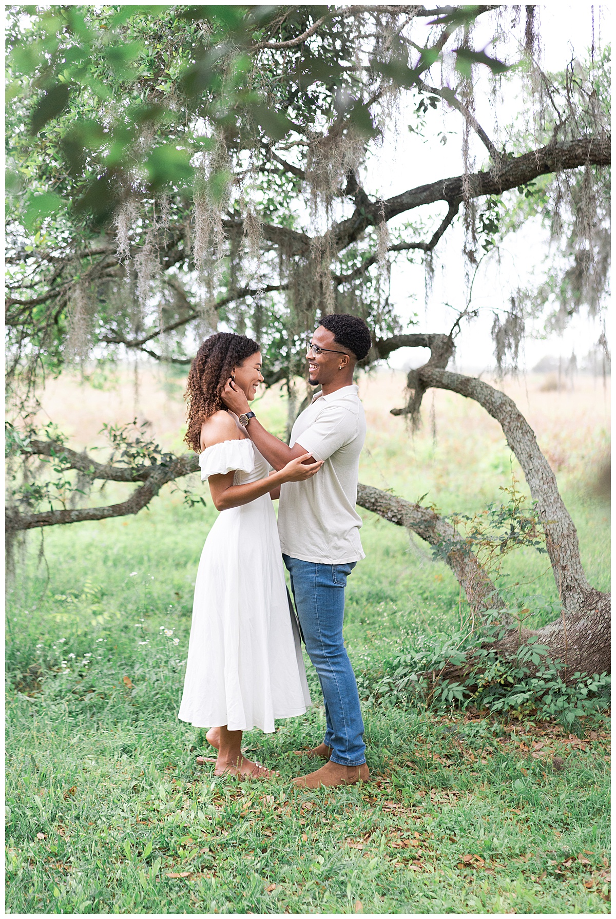 Couple smile at one another for Swish & Click Photography