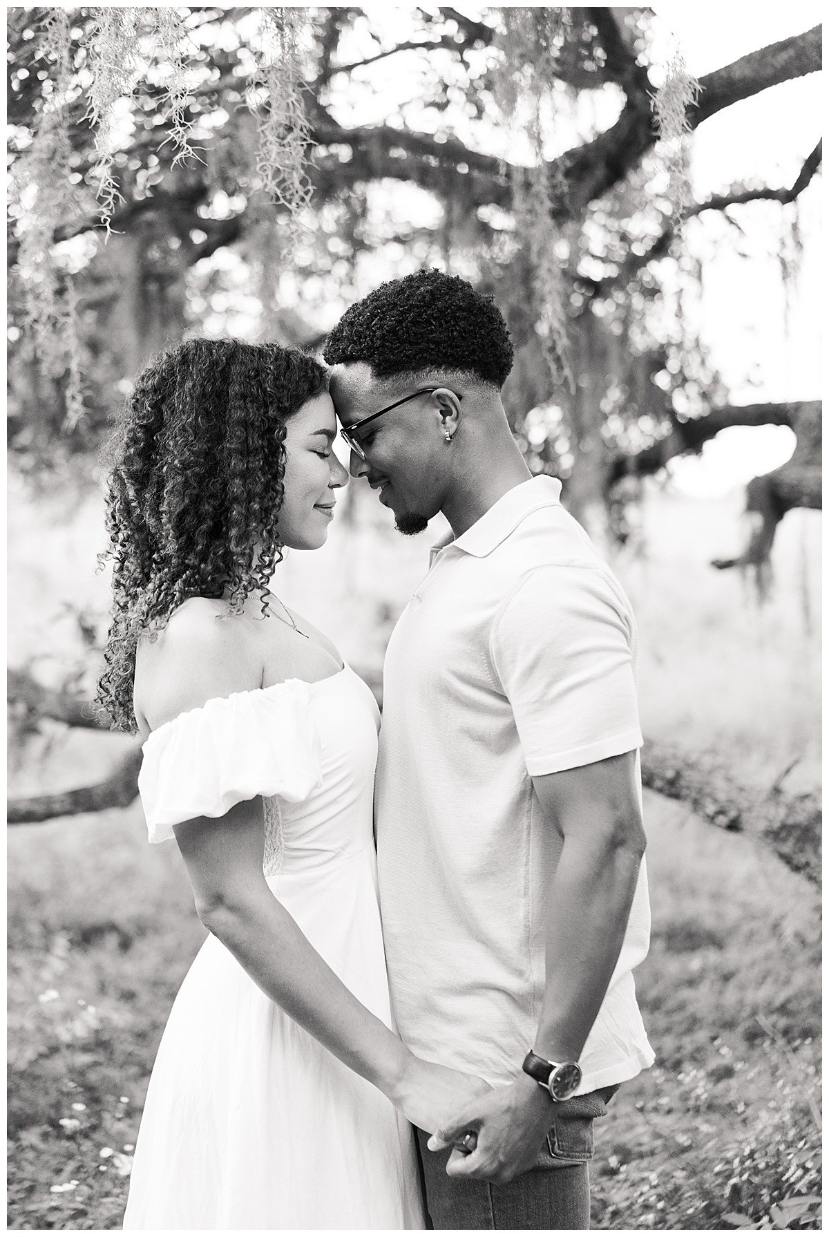 Couple stand close together during their Brazos Bend Engagement Photographer 