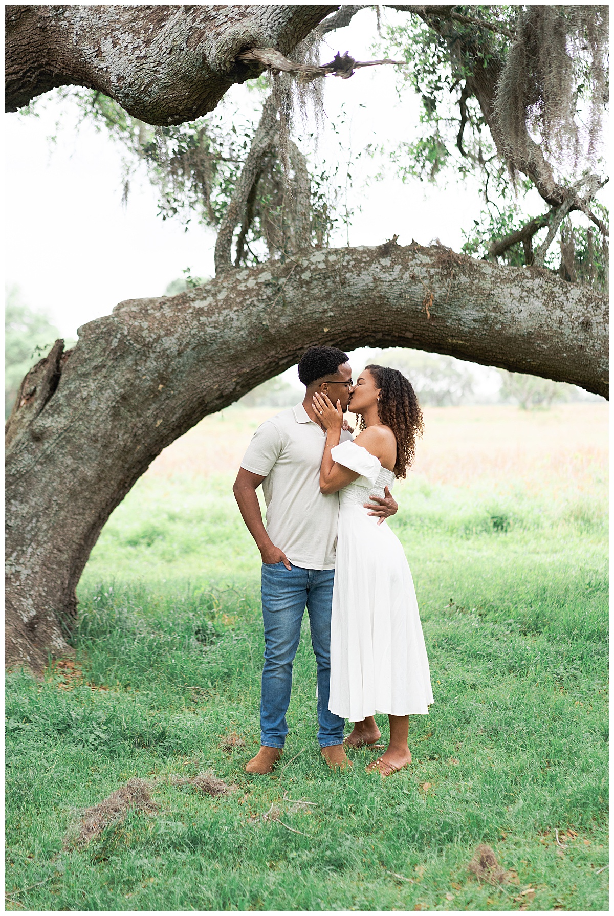 Couple share a kiss for Swish & Click Photography