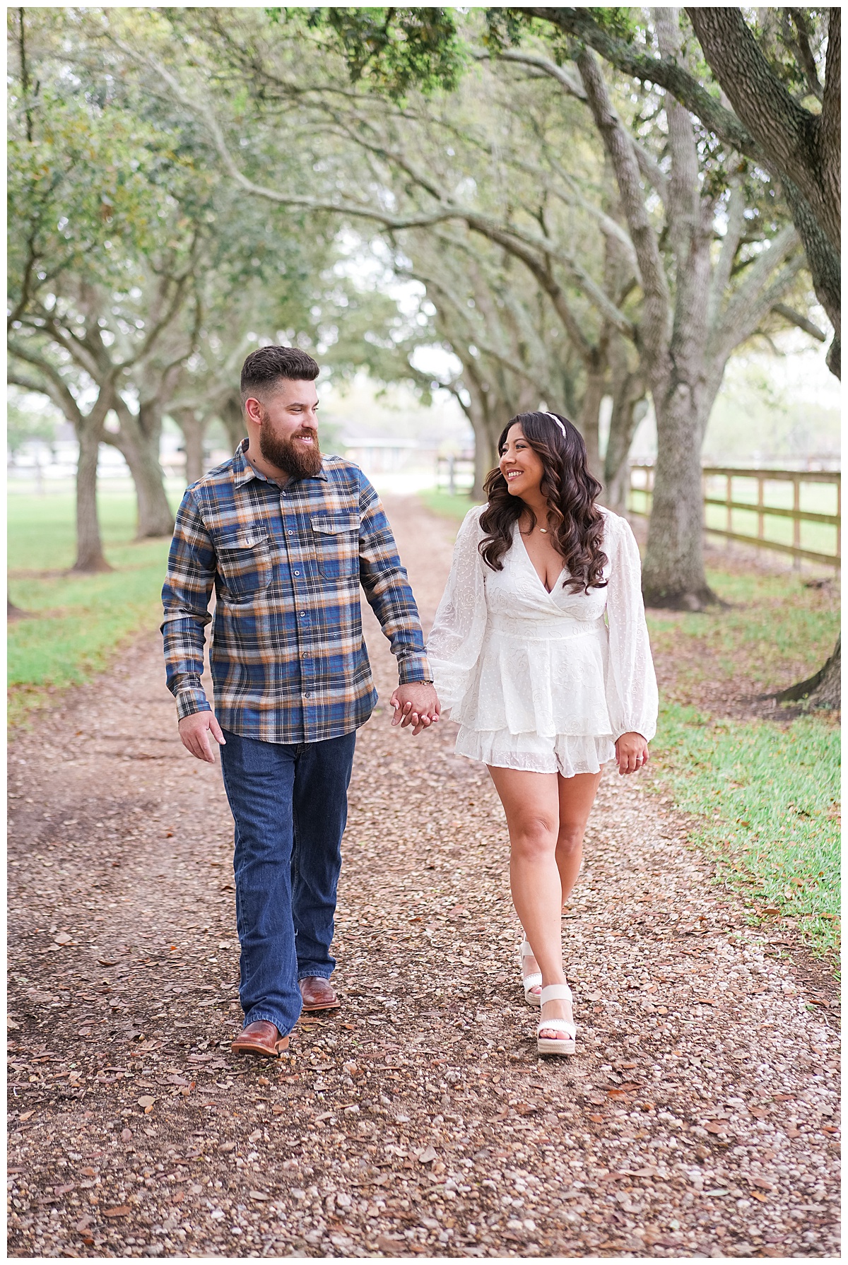 Man and woman walk hand in hand together for Houston’s Best Wedding Photographers