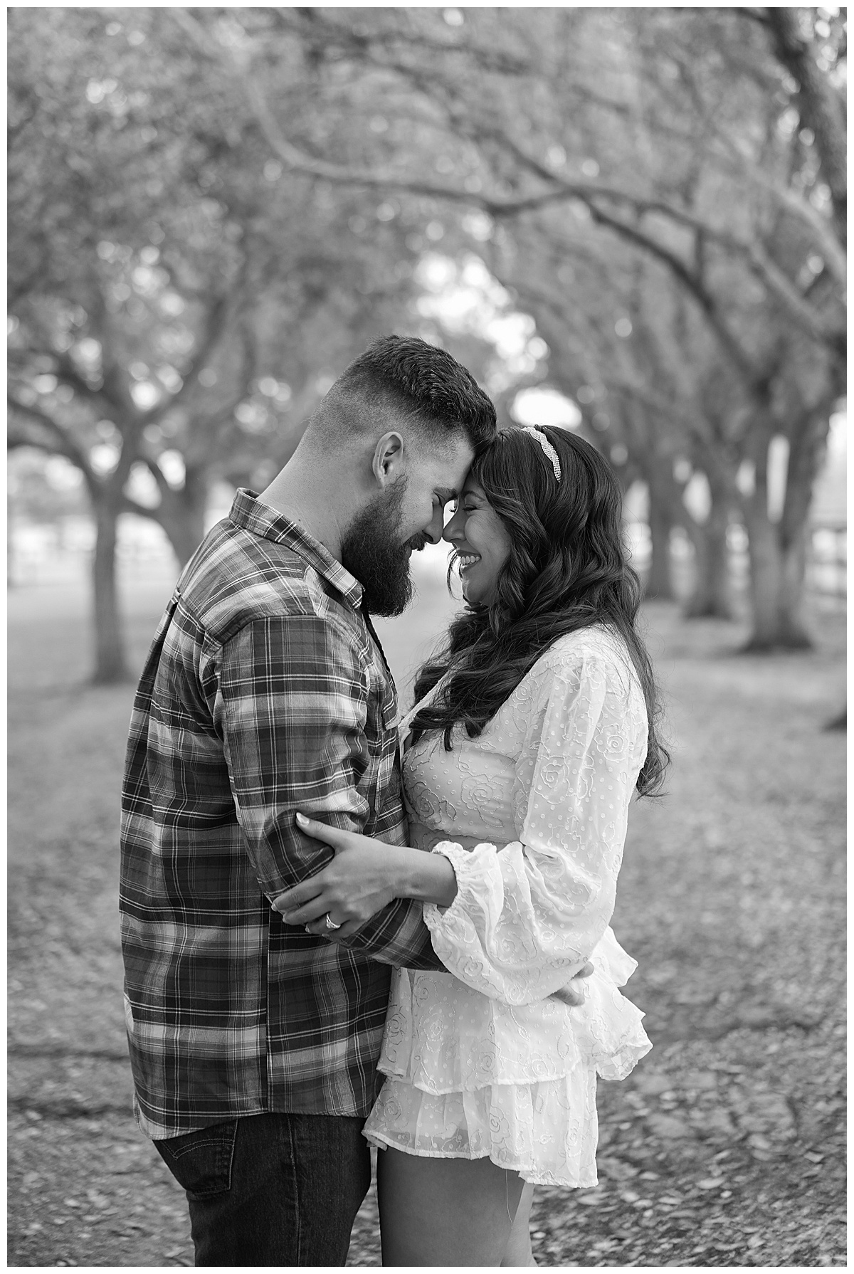 Couple stand head to head together during their Houston Disney Engagement Session