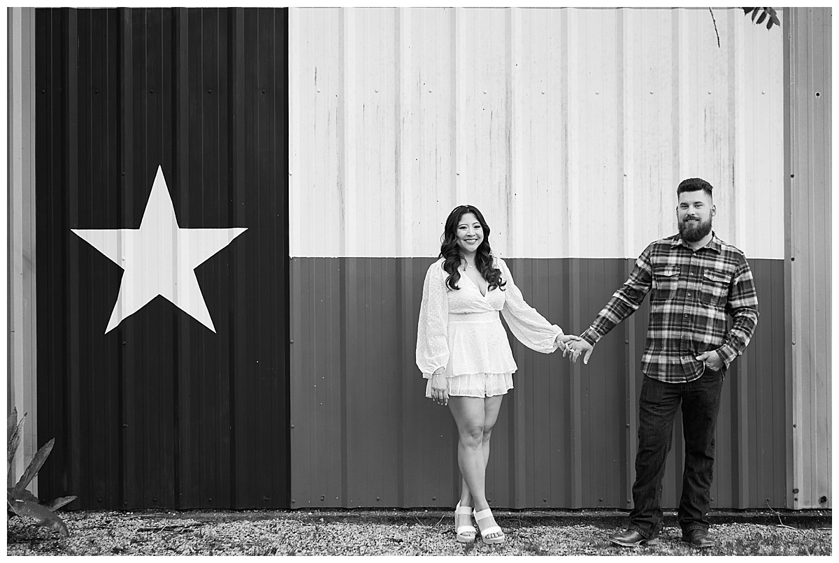 Couple stand together holding hands for Houston’s Best Wedding Photographers