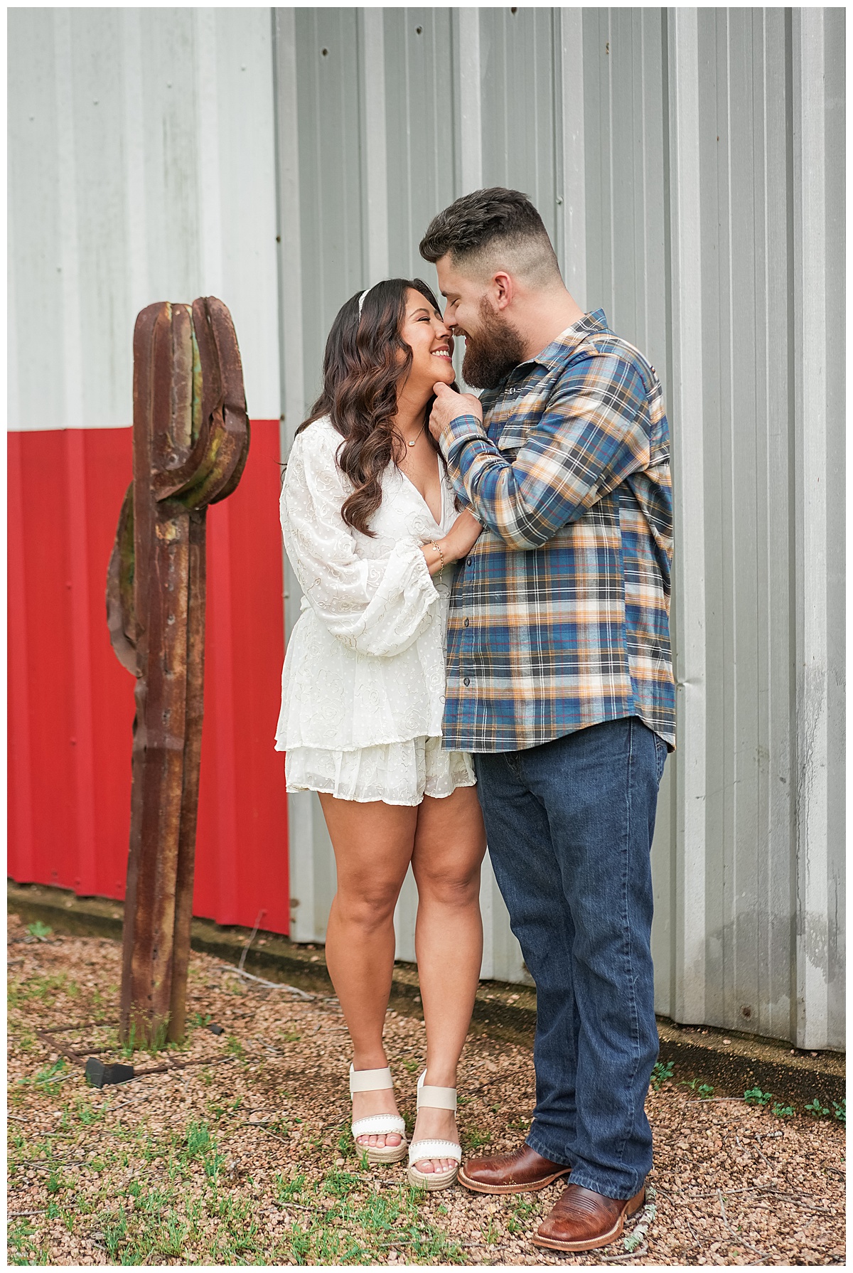 Couple share a kiss for Swish & Click Photography