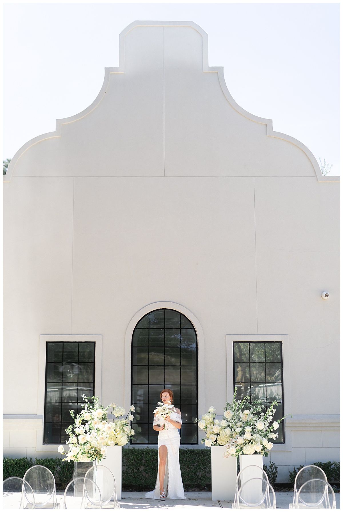Bride stands outside Southwestern chapel for Peach Orchard Wedding Photographer