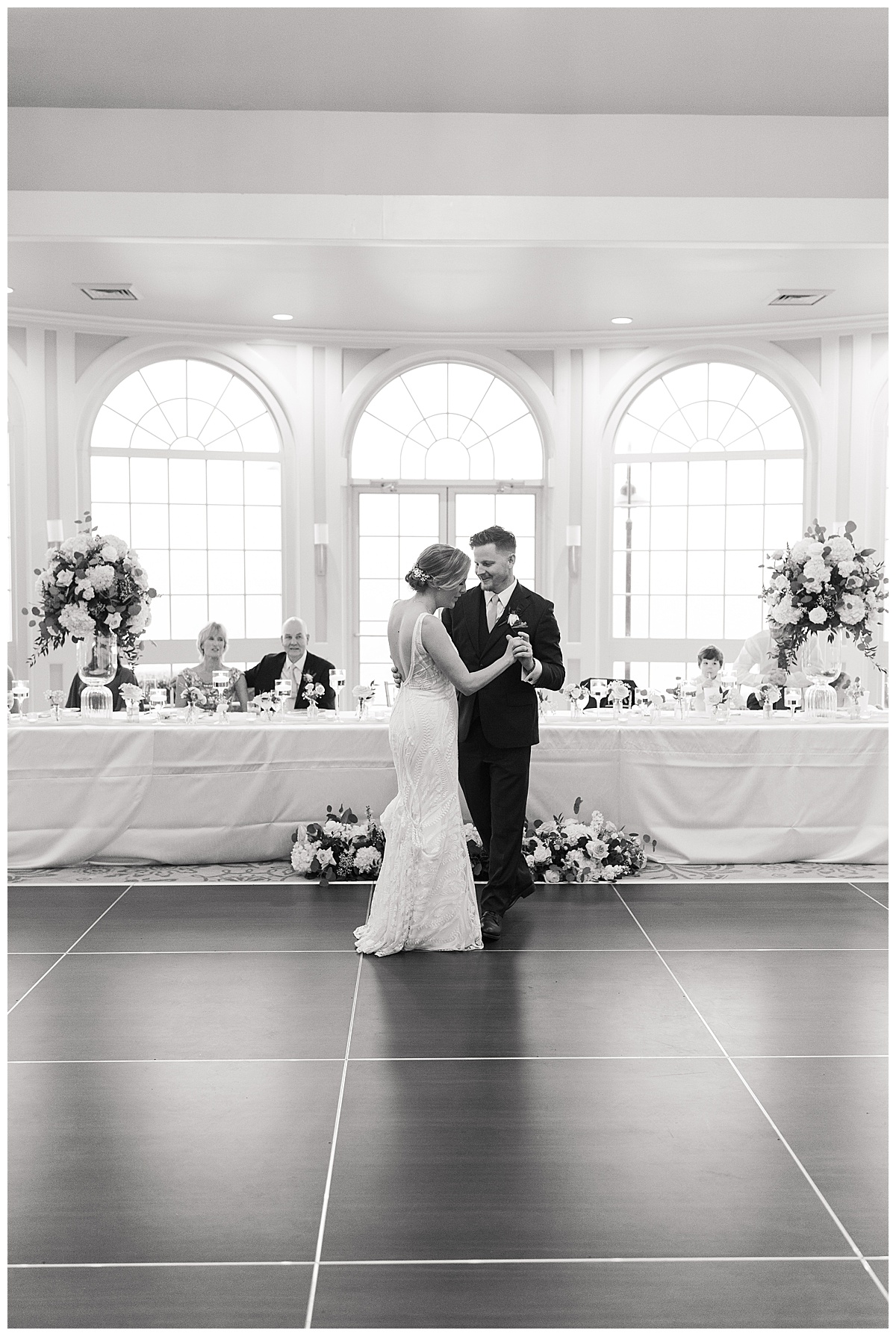 Couple share their first dance together for Swish & Click Photography