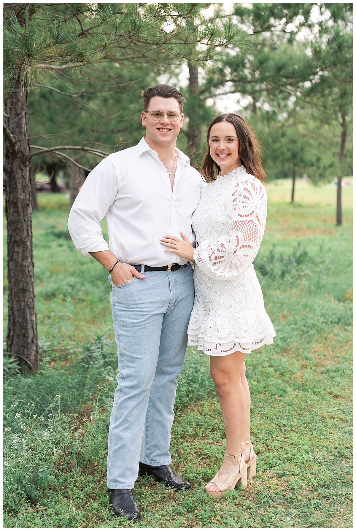 Couple stand and smile together during their Eleanor Tinsley Park Engagement Session
