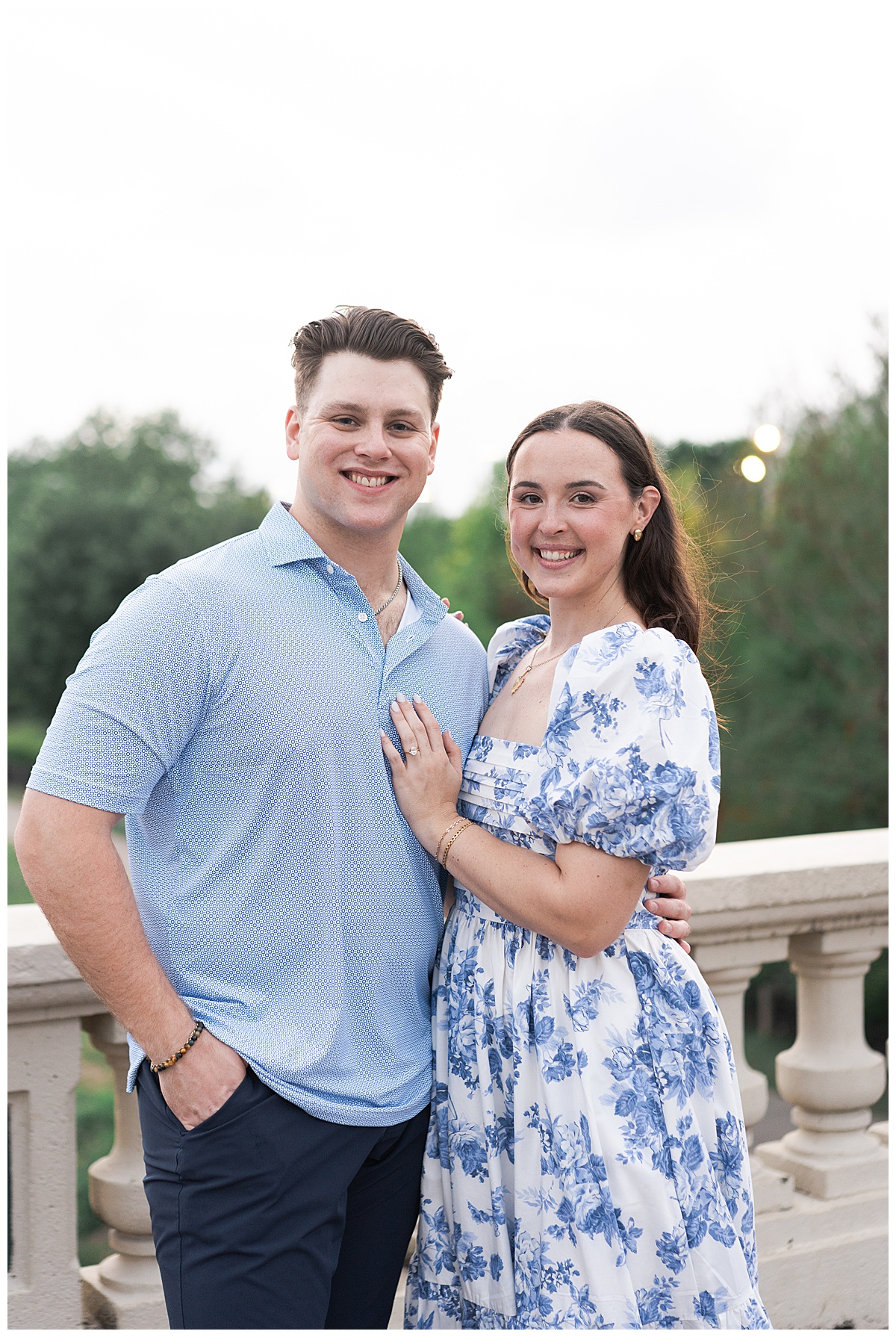 Man and woman share a smile together during their Eleanor Tinsley Park Engagement Session