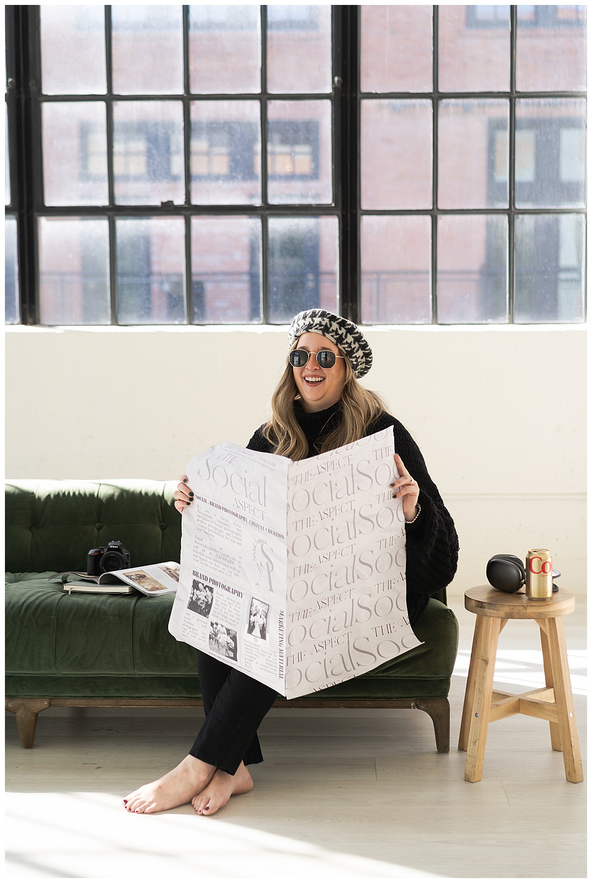 Woman holds newspaper for Houston Editorial Branding Photographer