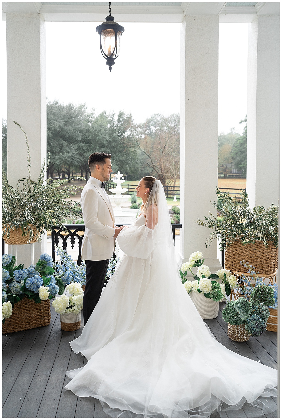 Bride and groom smile at one another for Swish & Click Photography