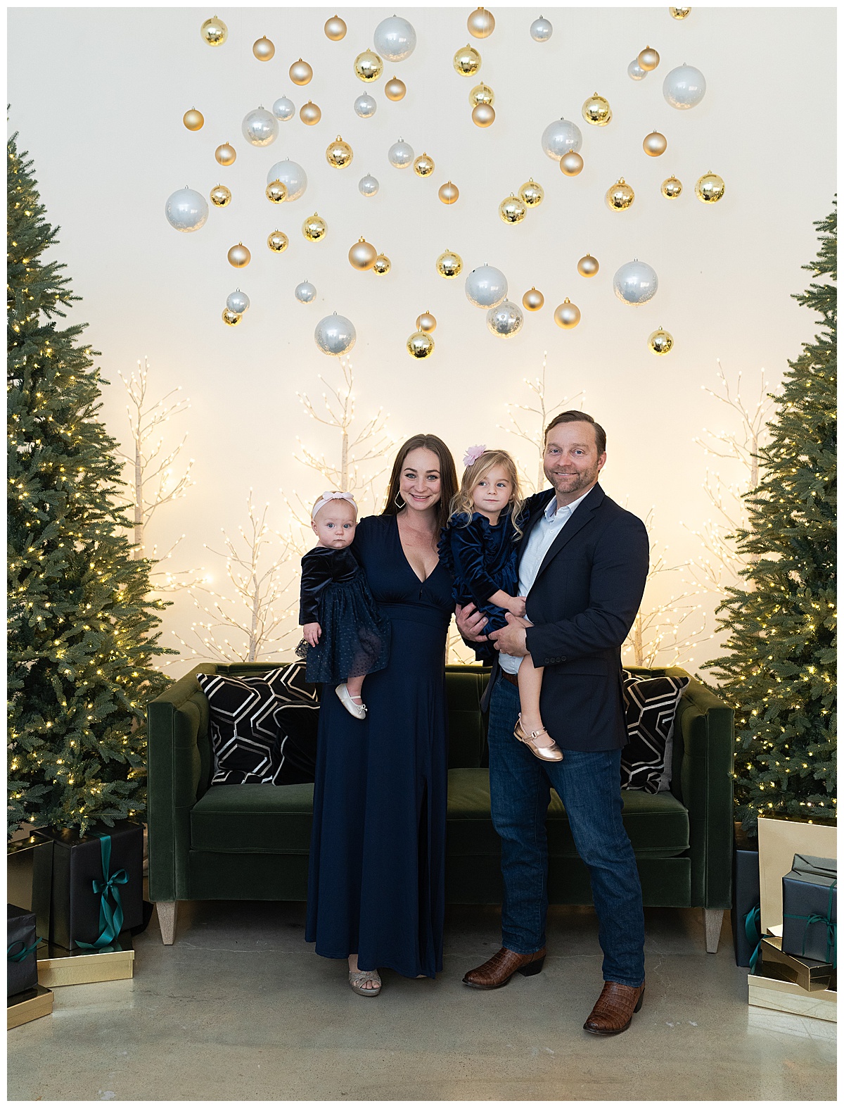 Family stand together during their Christmas Minis In Houston