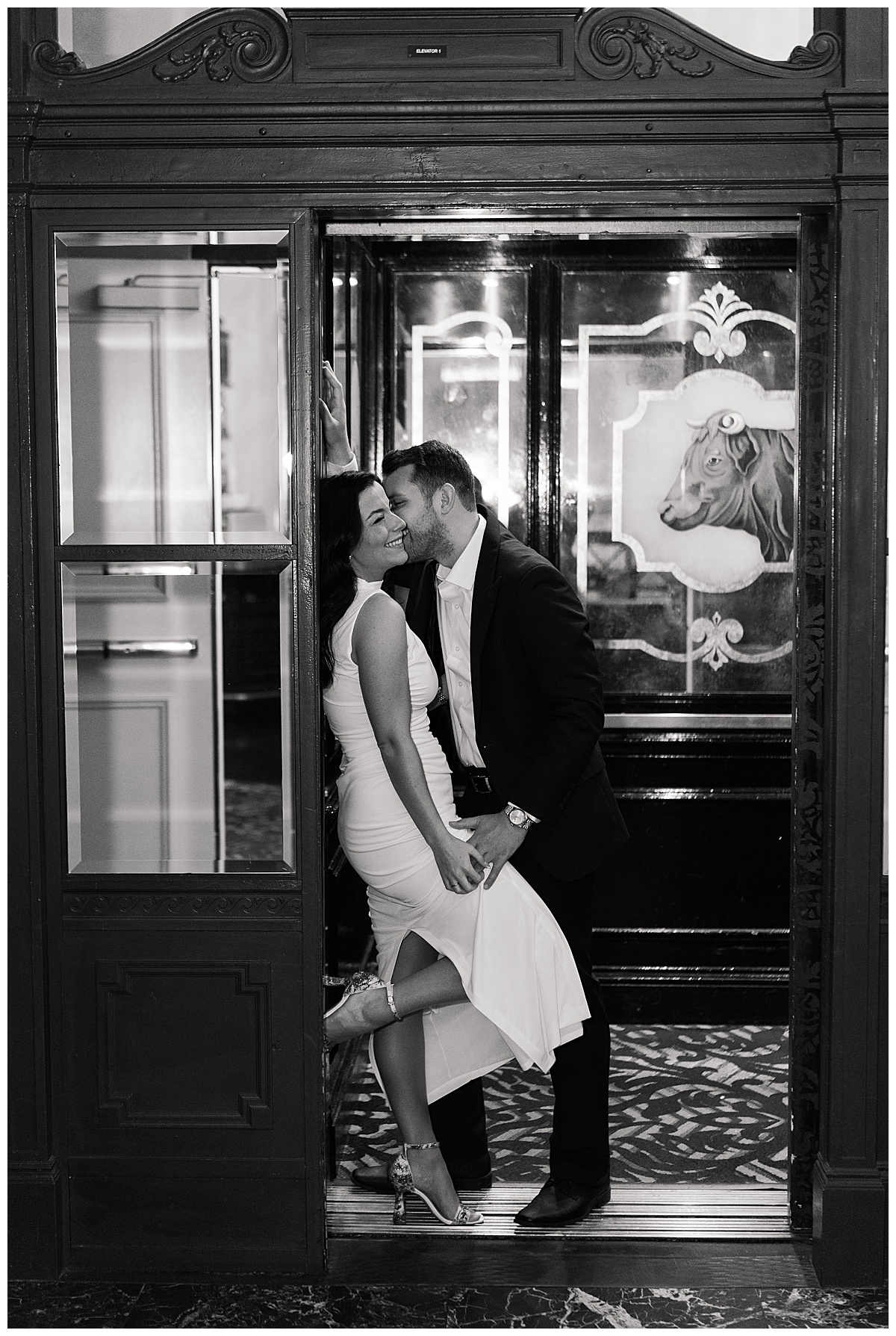 Couple hold each other close for Hotel Icon Engagement Session