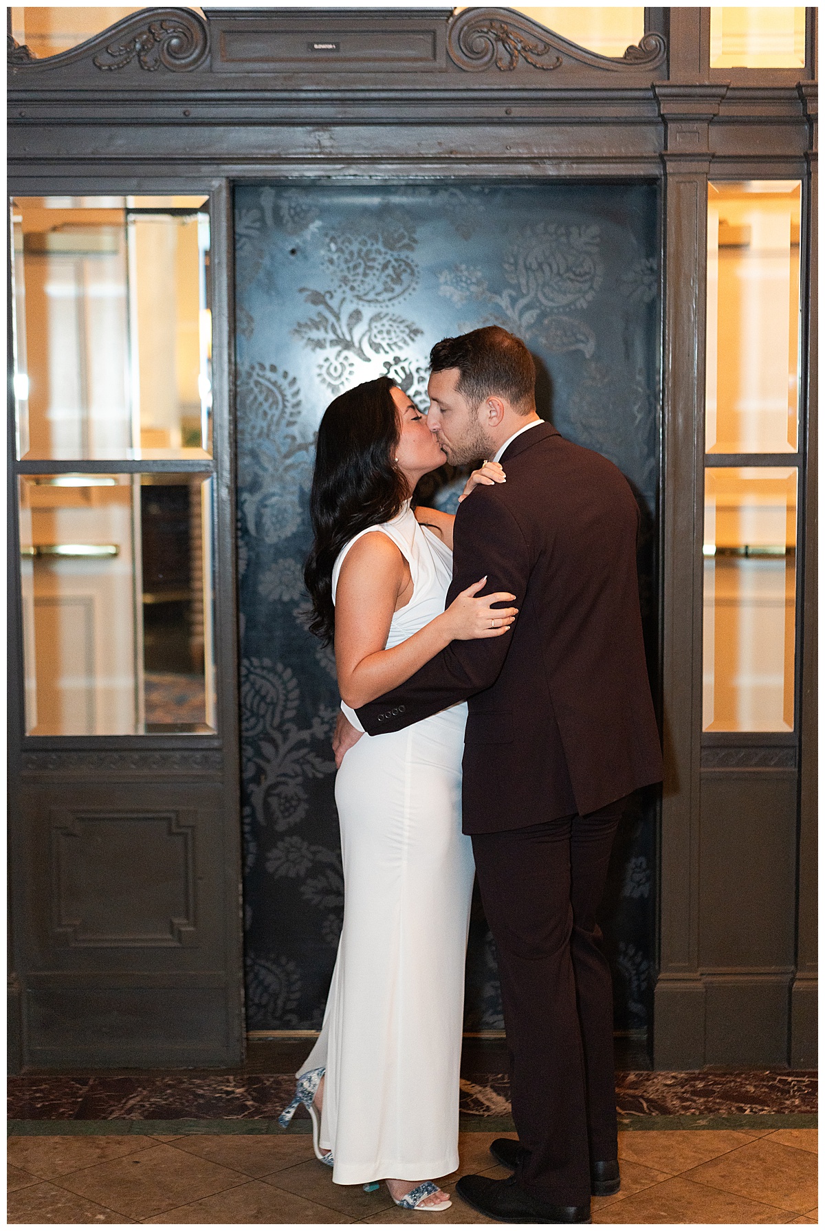 Engaged couple share a kiss for Houston’s Best Wedding Photographers