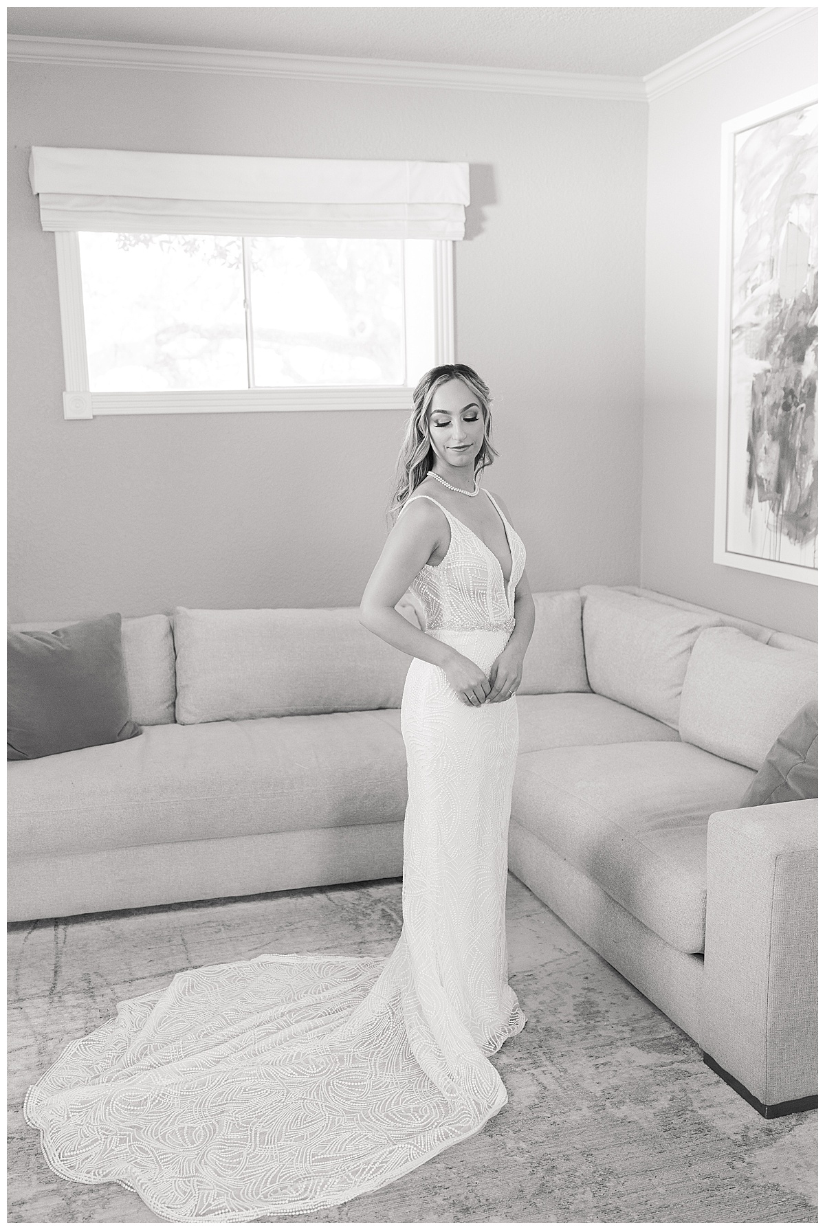 Bride gets ready in bridal gown during her Stonehouse Villa Wedding