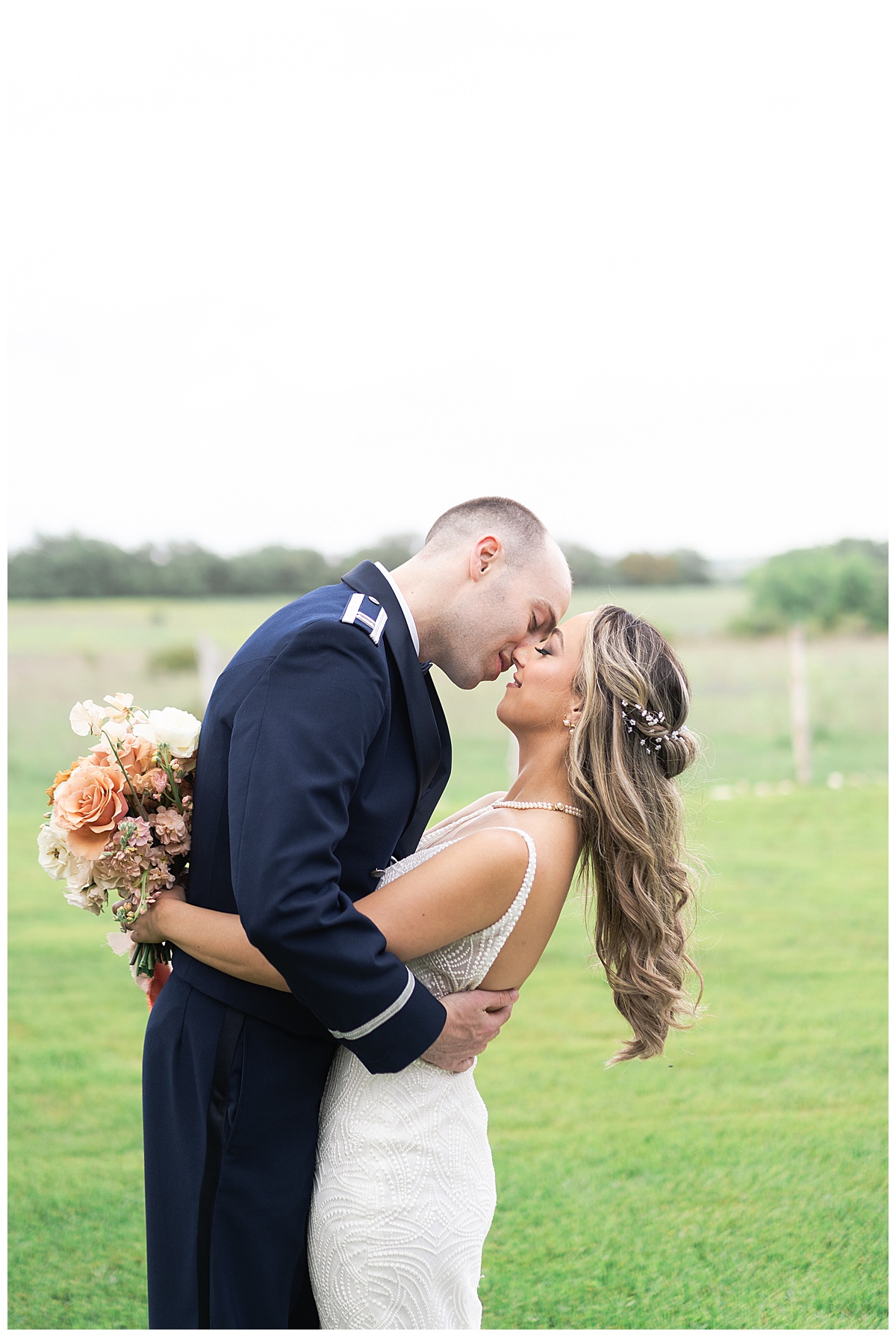 Husband and wife share a kiss during their Stonehouse Villa Wedding