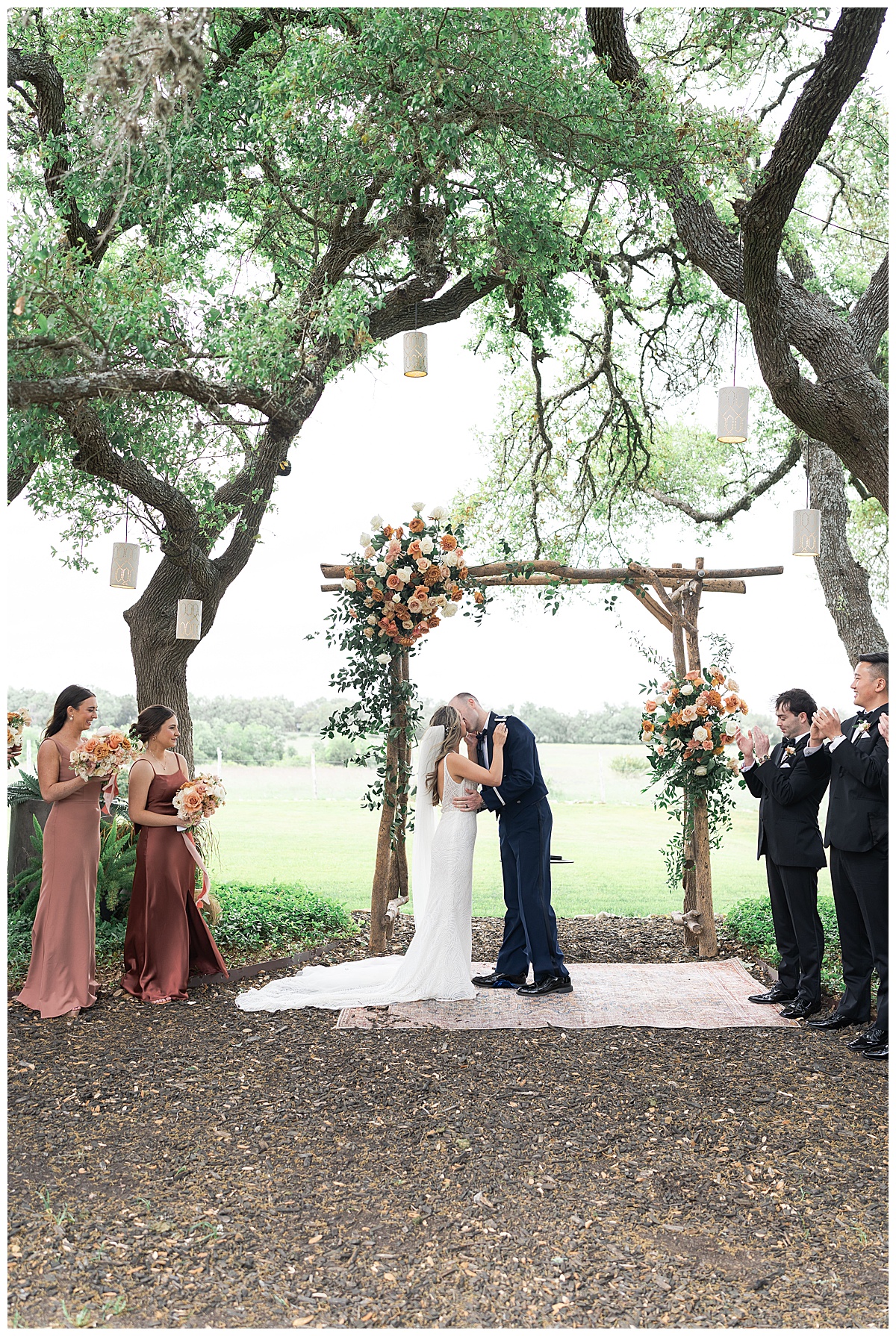 Couple share a kiss during their Stonehouse Villa Wedding