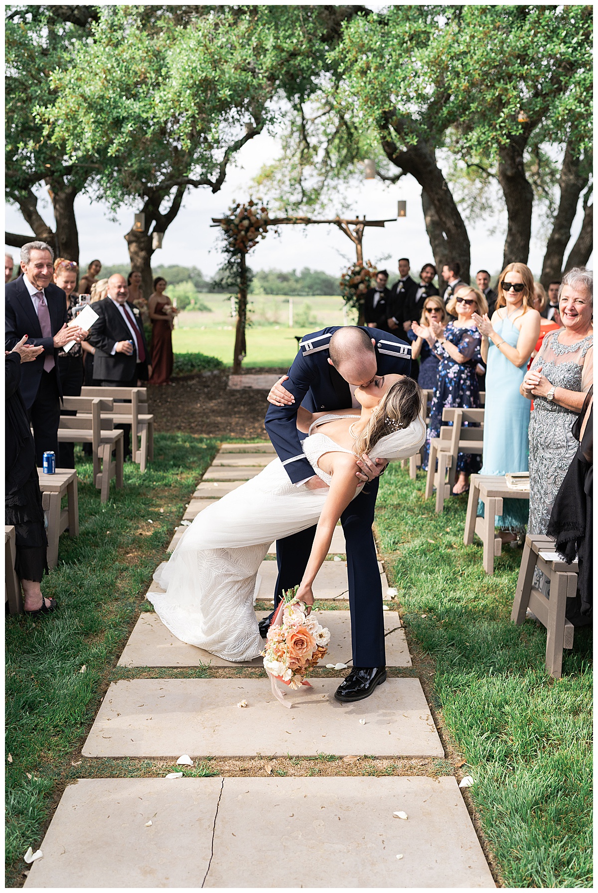 Husband and wife share a kiss for Swish & Click Photography