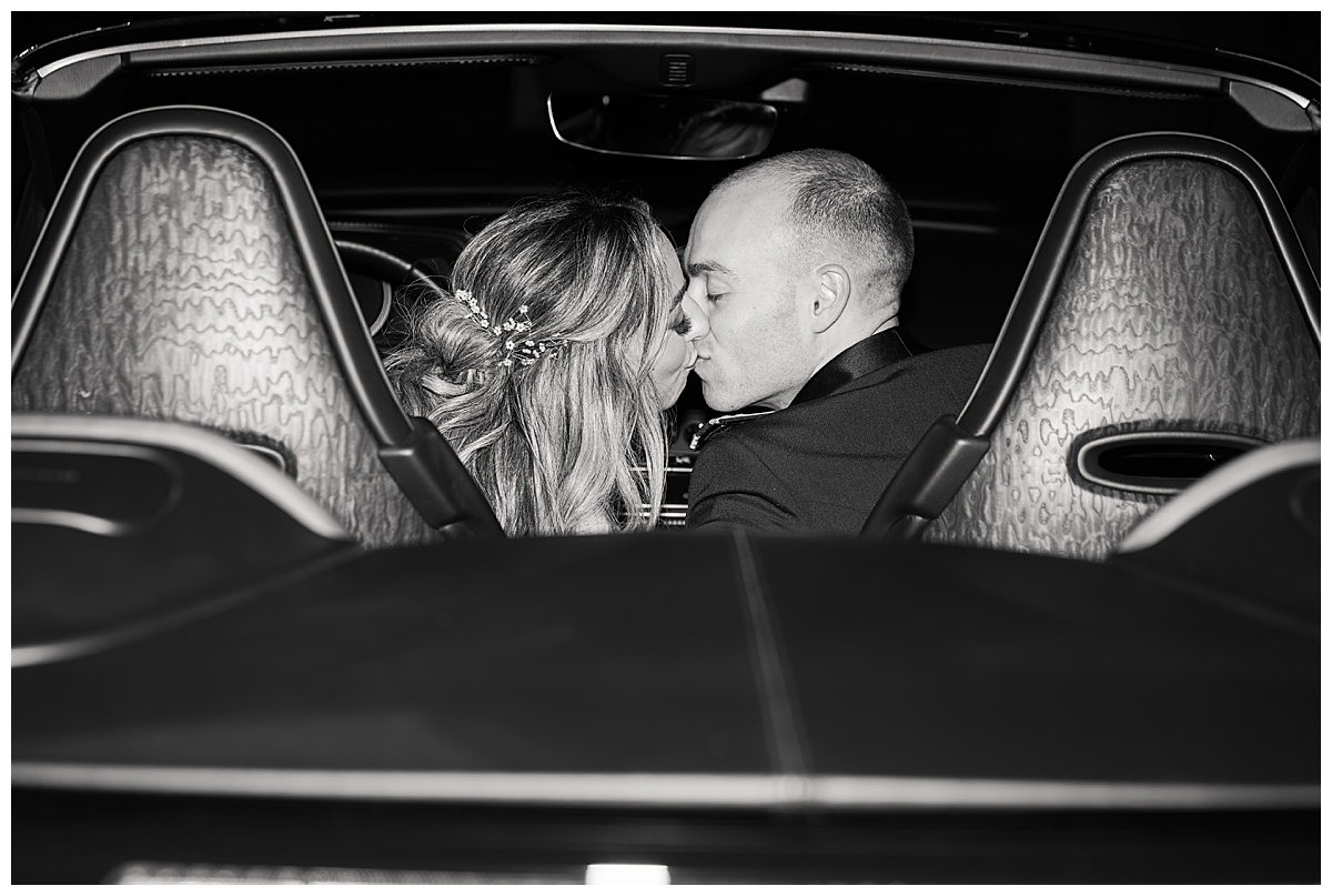 Couple share a kiss for Swish & Click Photography