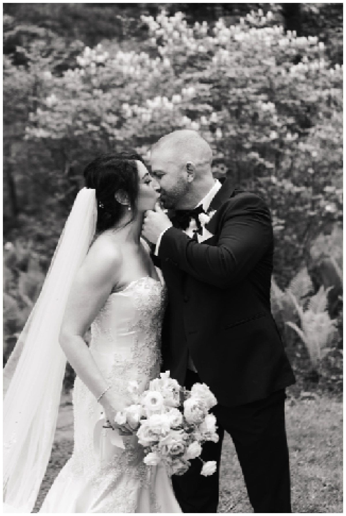 Husband and wife share a kiss for Swish & Click Photography