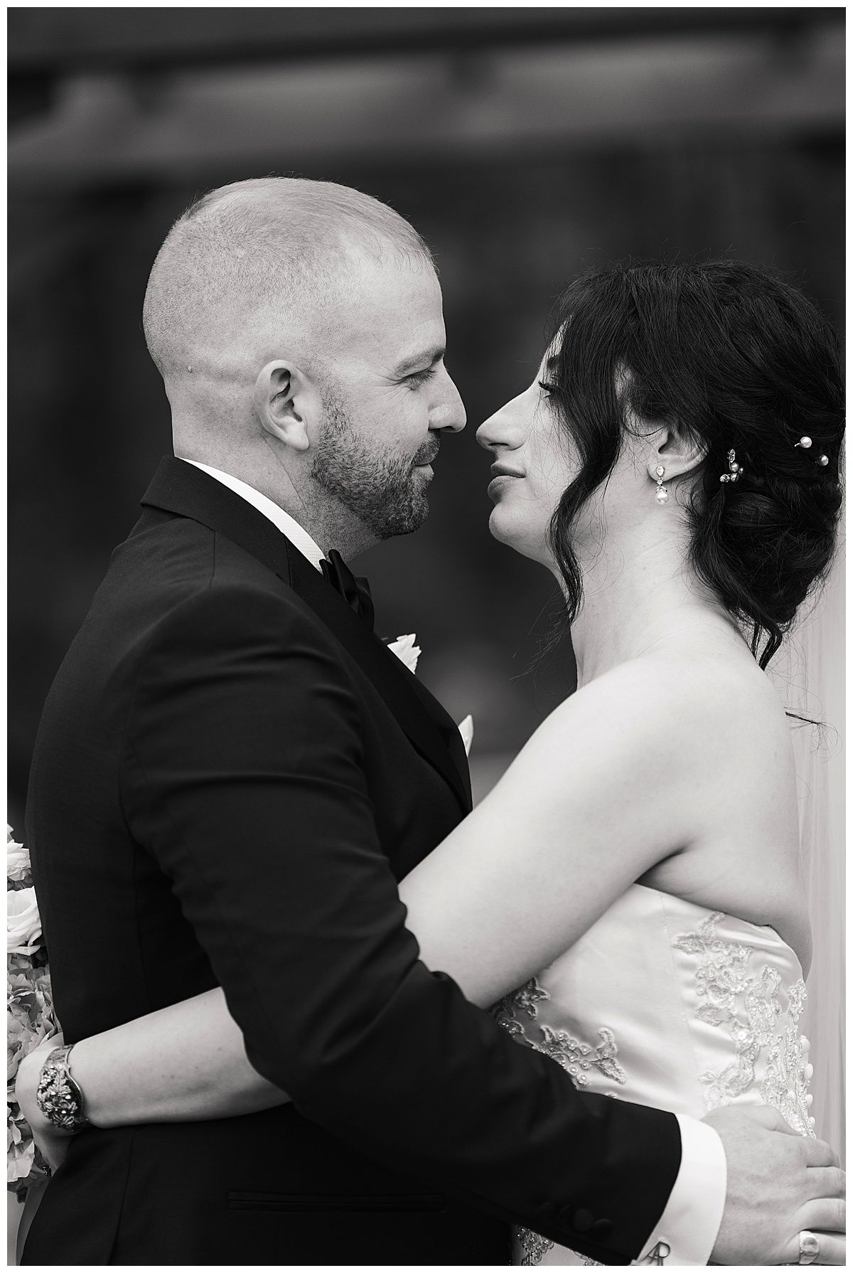 Bride and groom smile at one another for Swish & Click Photography