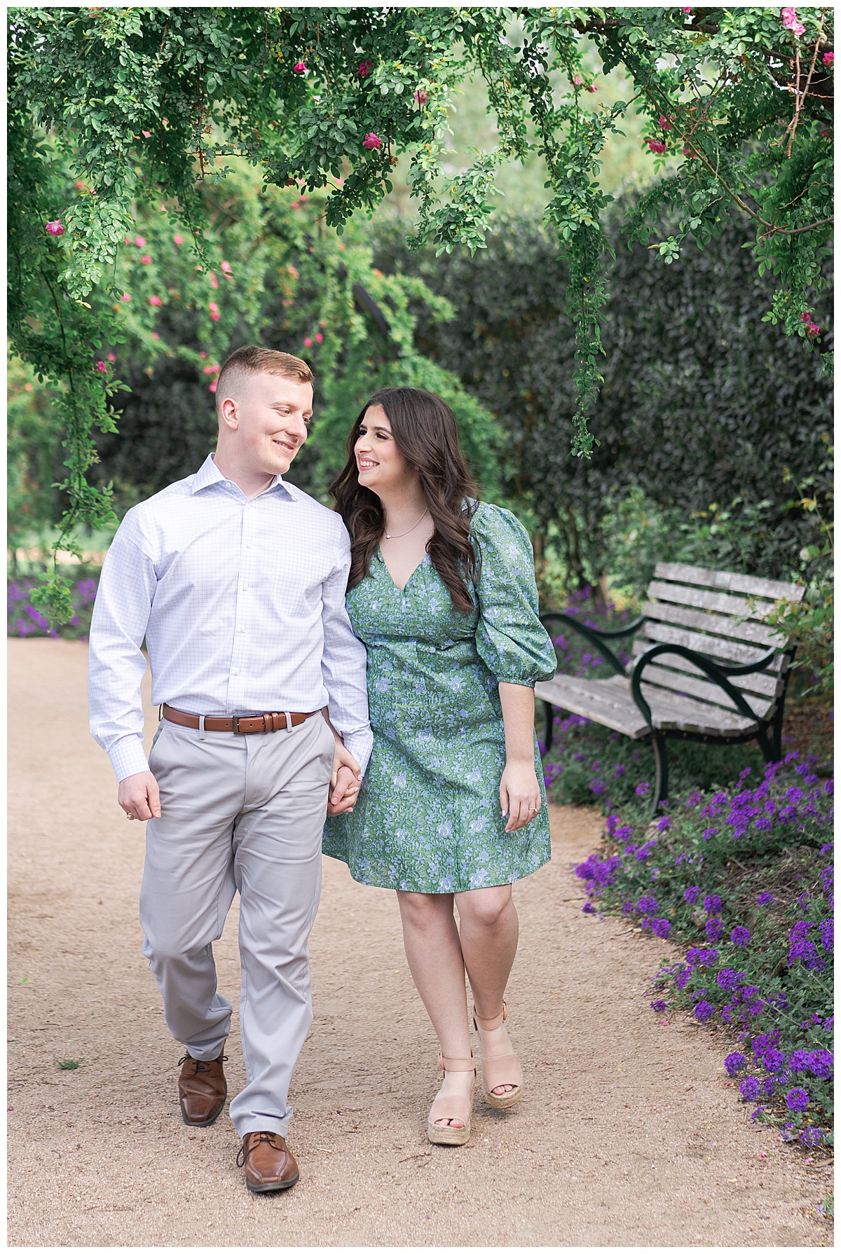 Couple smile at one another by Swish & Click Photography