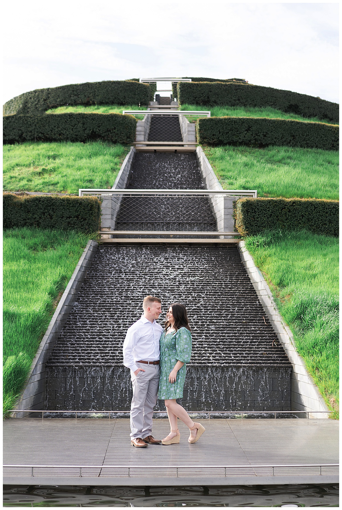 Man and woman smile at each other showing one of the Best Engagement Photo Locations in Houston